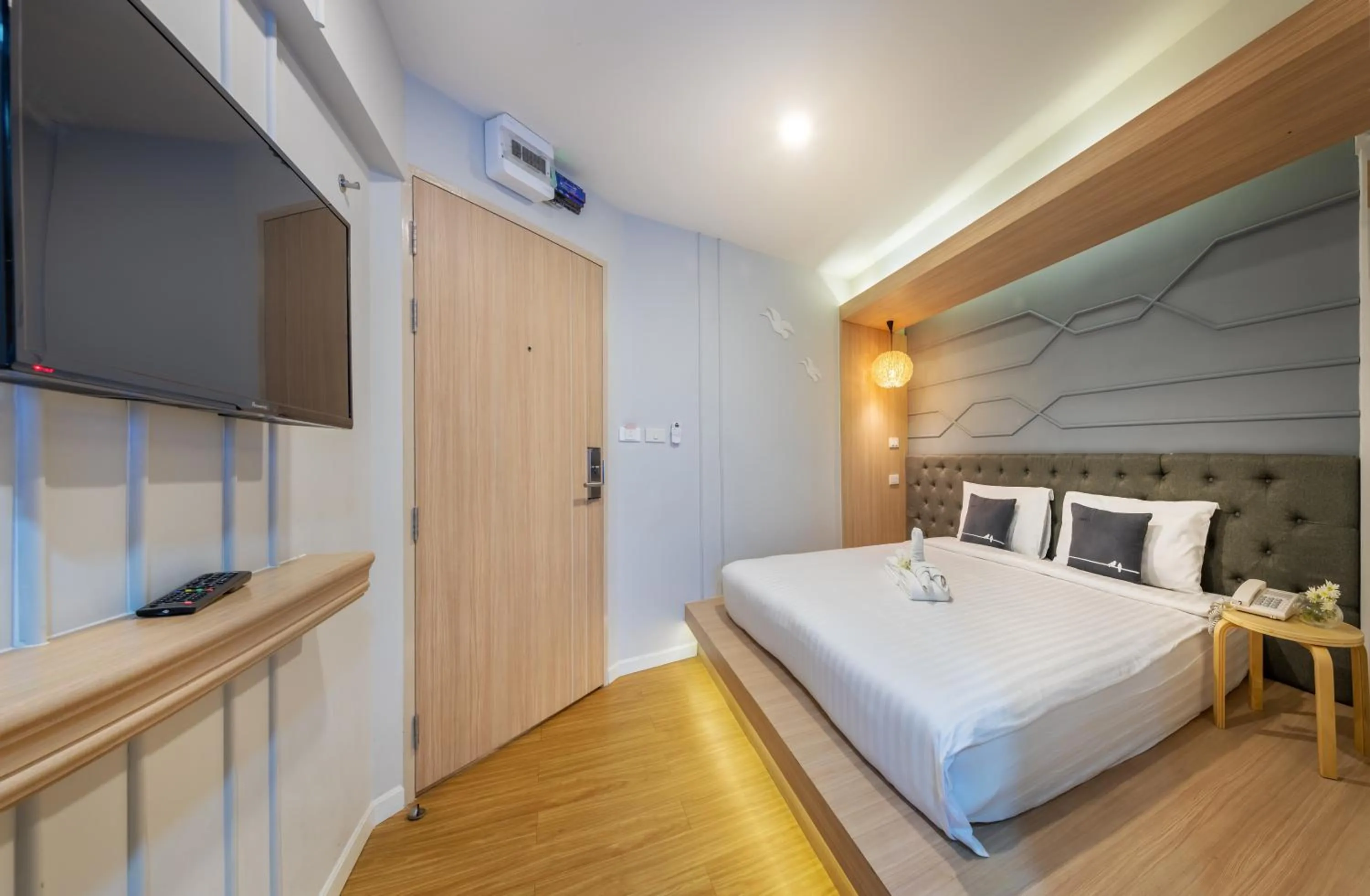 Bed in Tori Prestige Bangkok Hotel