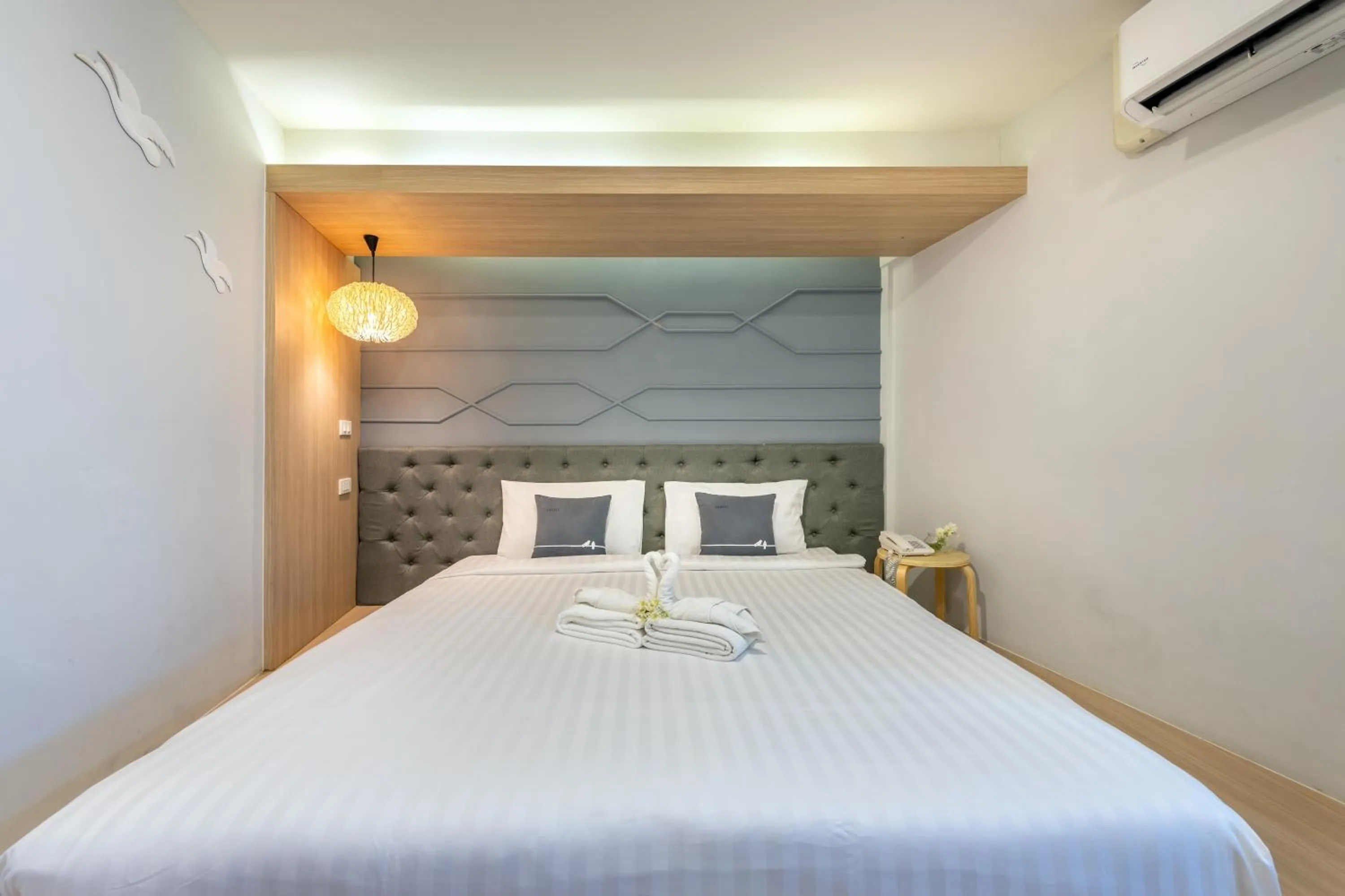 Bed in Tori Prestige Bangkok Hotel