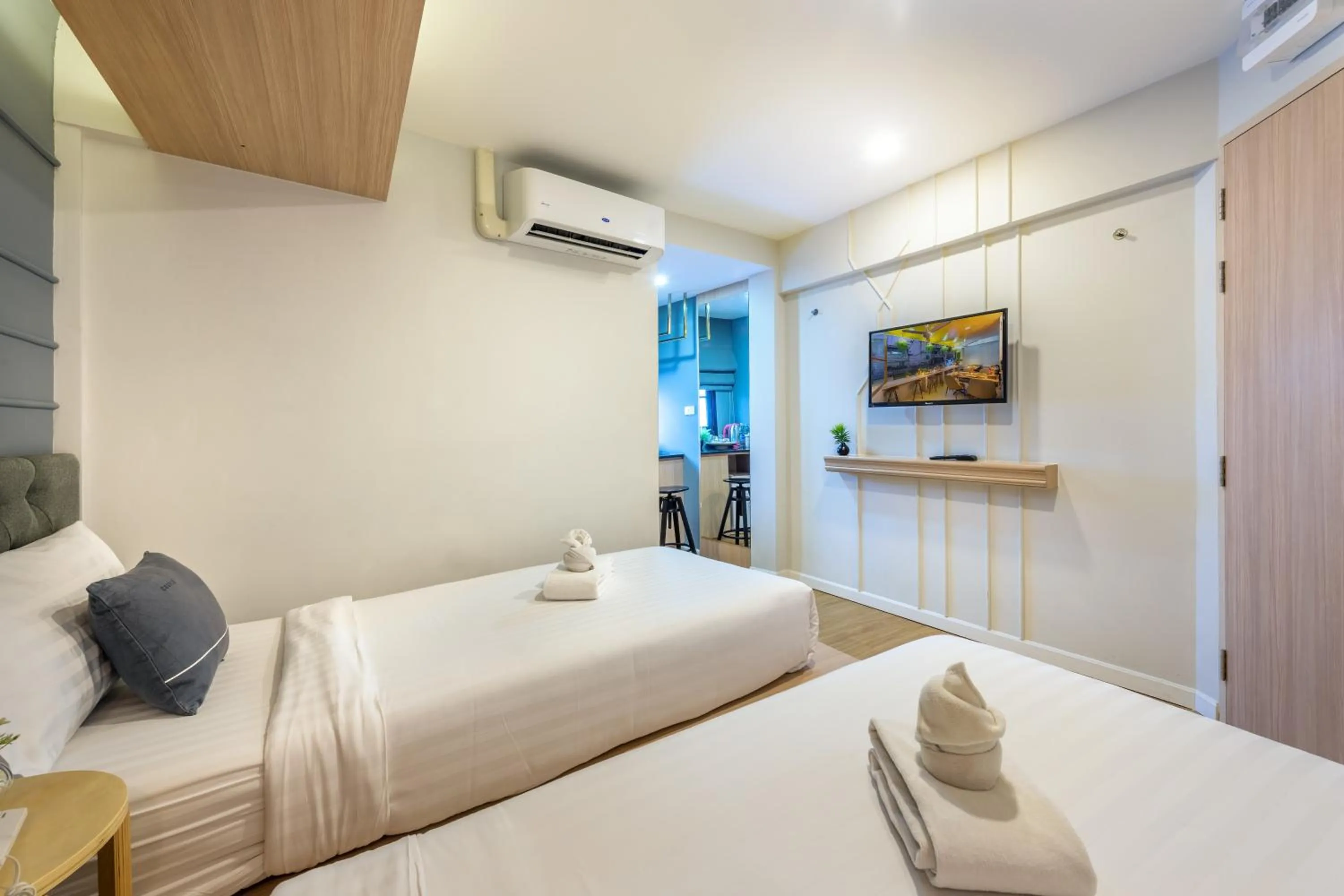 Bed in Tori Prestige Bangkok Hotel