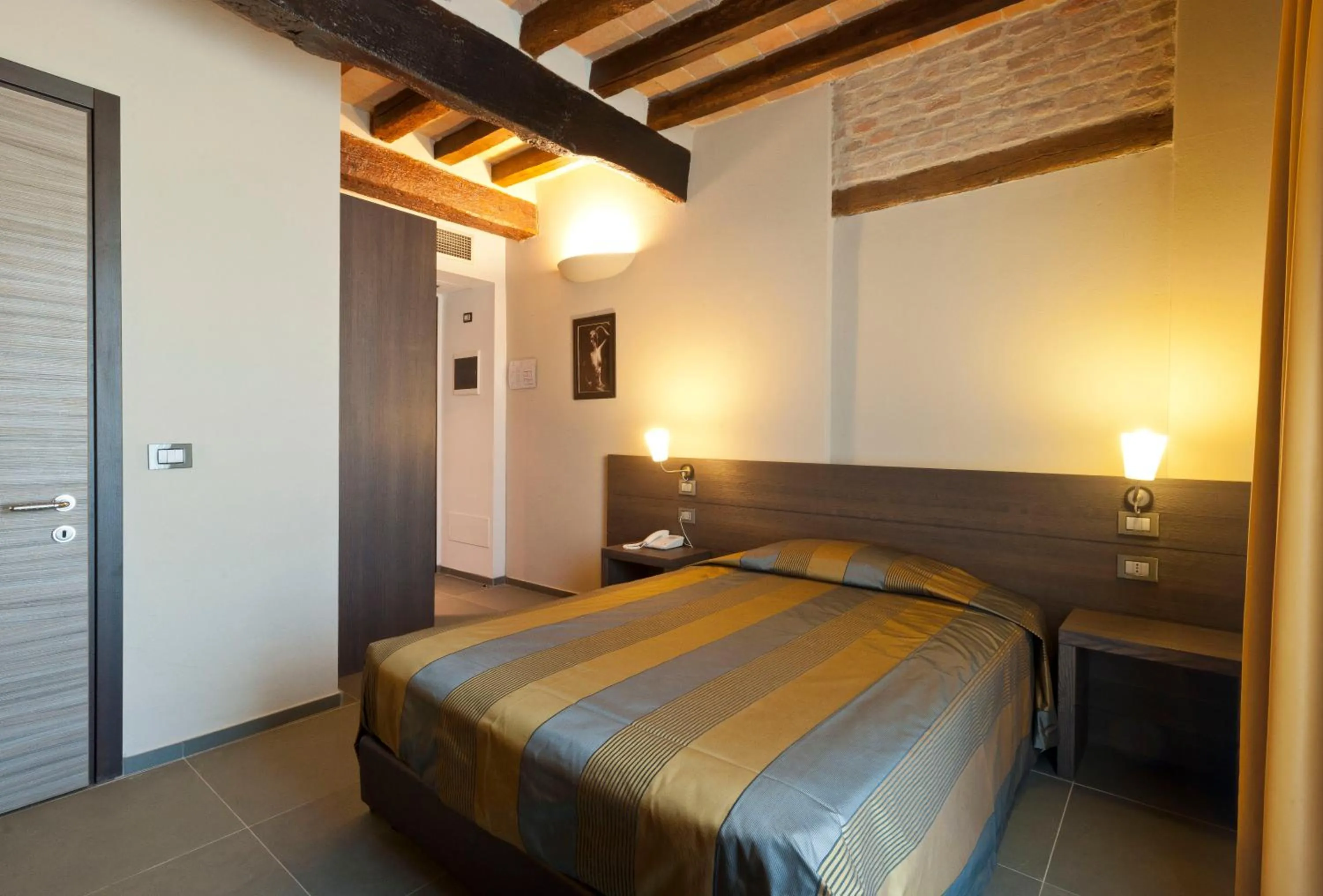 Bed in Locanda Sant'Ambrogio
