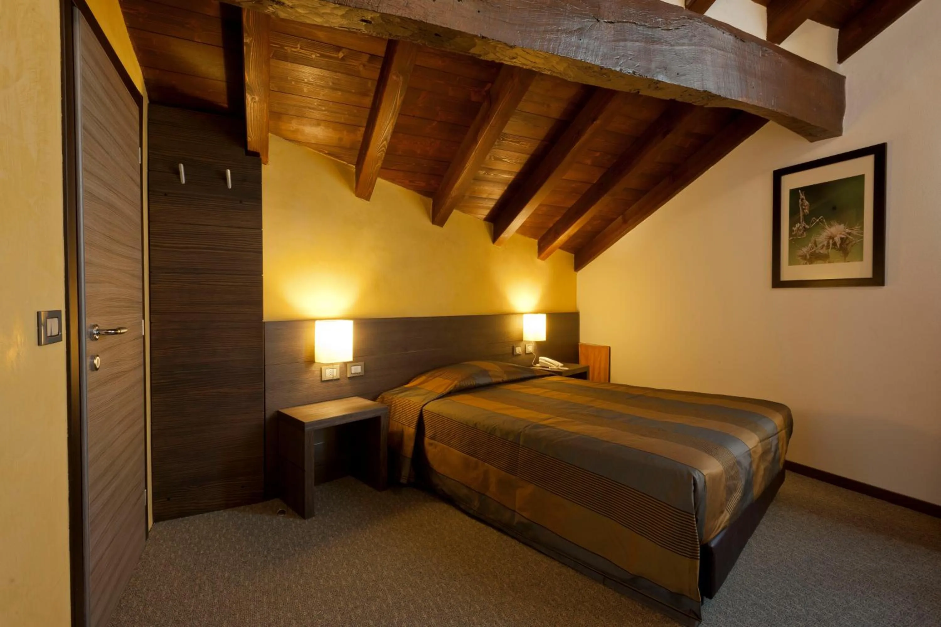 Bed in Locanda Sant'Ambrogio