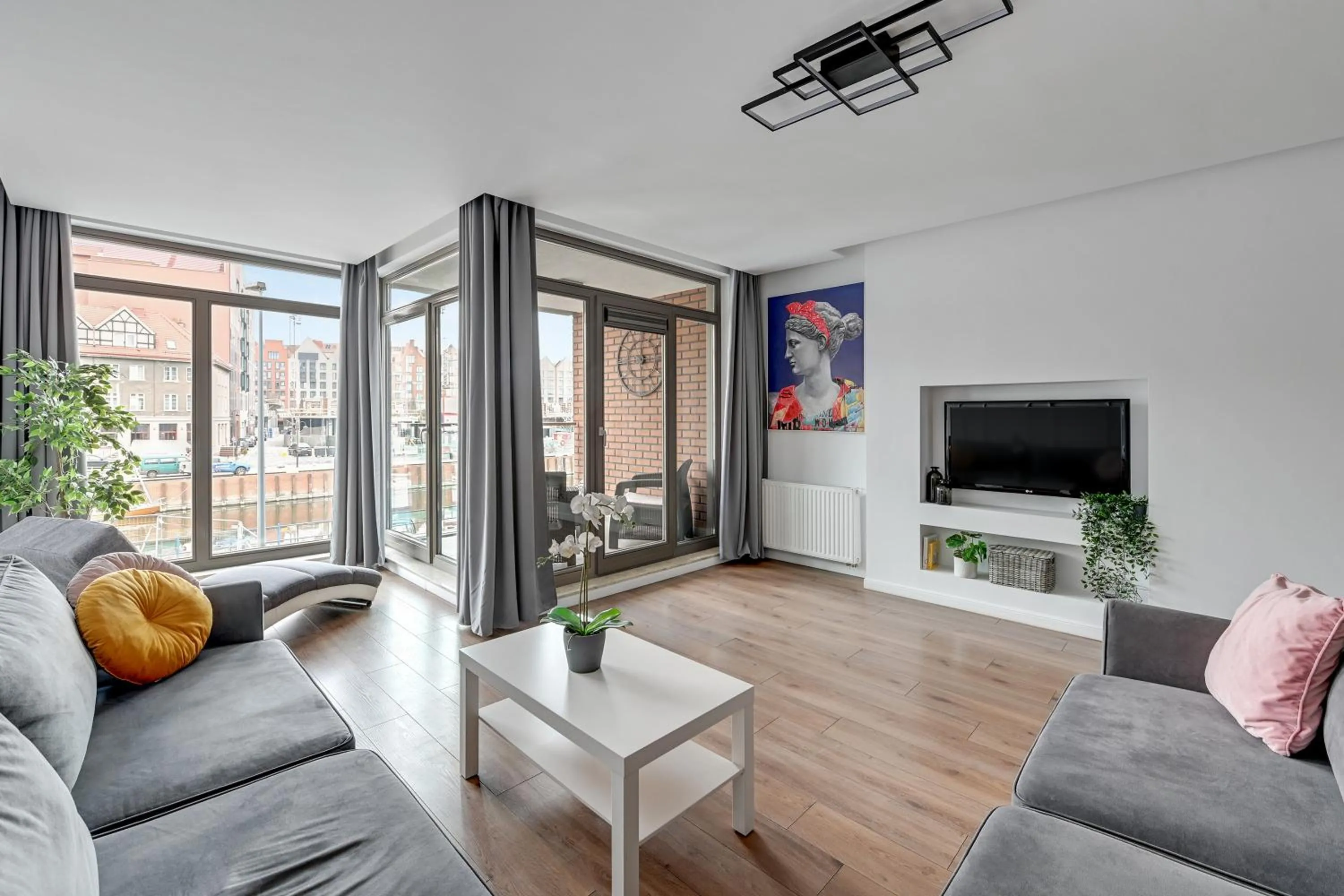 TV and multimedia in Waterlane Riverside - SPA, Pool, Gym & Parking by Downtown Apartments