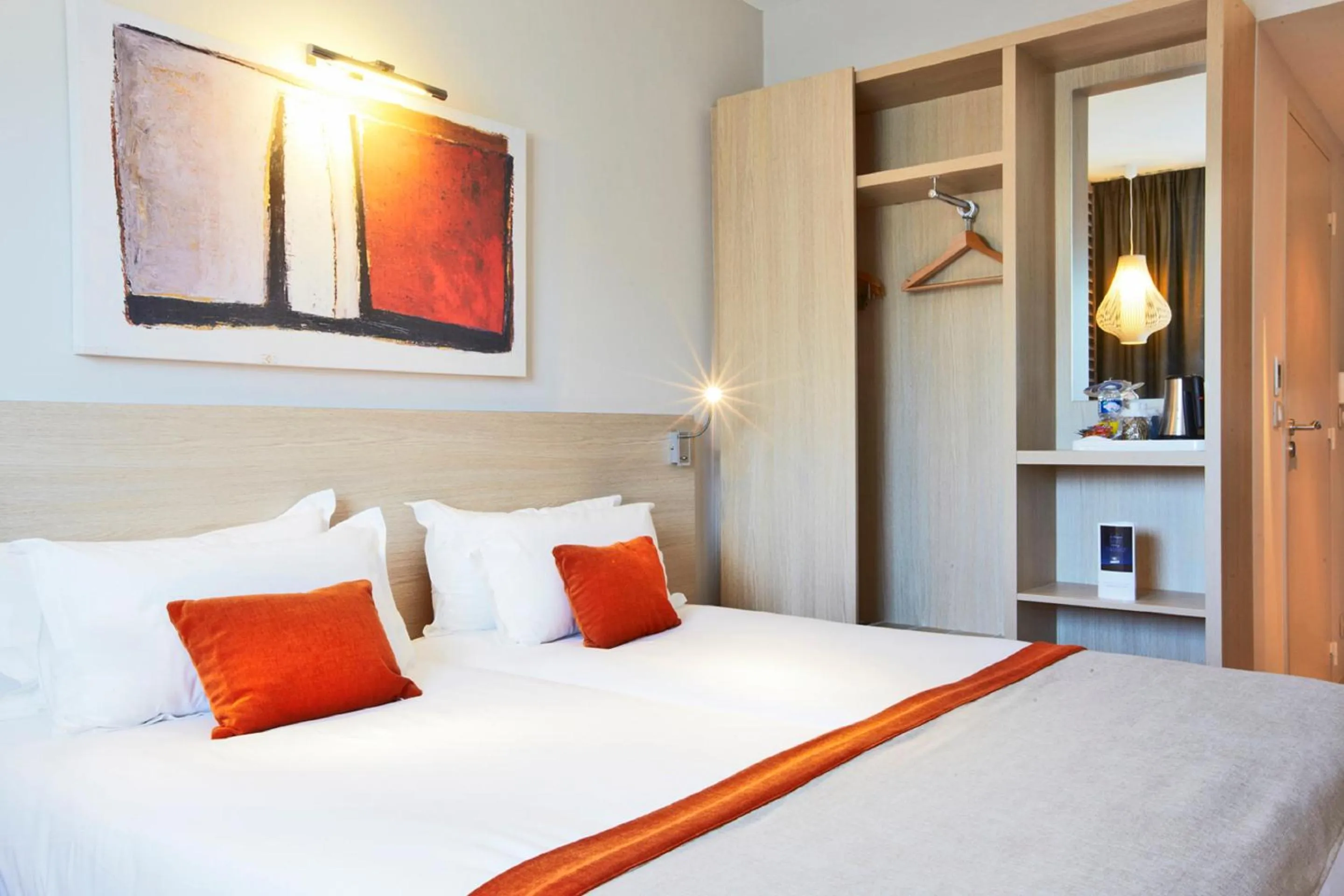 Bedroom, Bed in Kyriad Prestige Vannes Centre-Palais des Arts