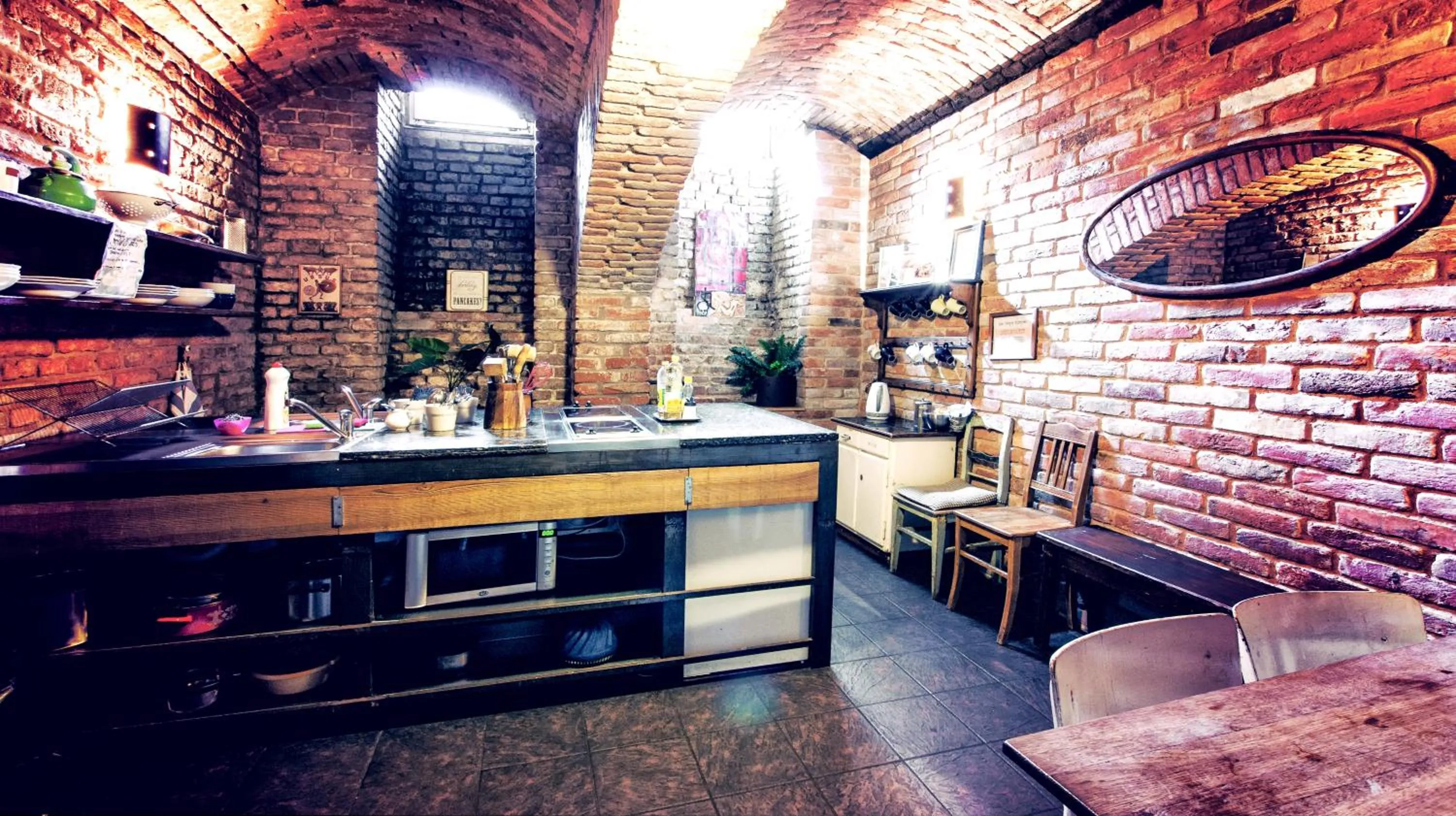 Communal kitchen in Sir Toby's Hostel