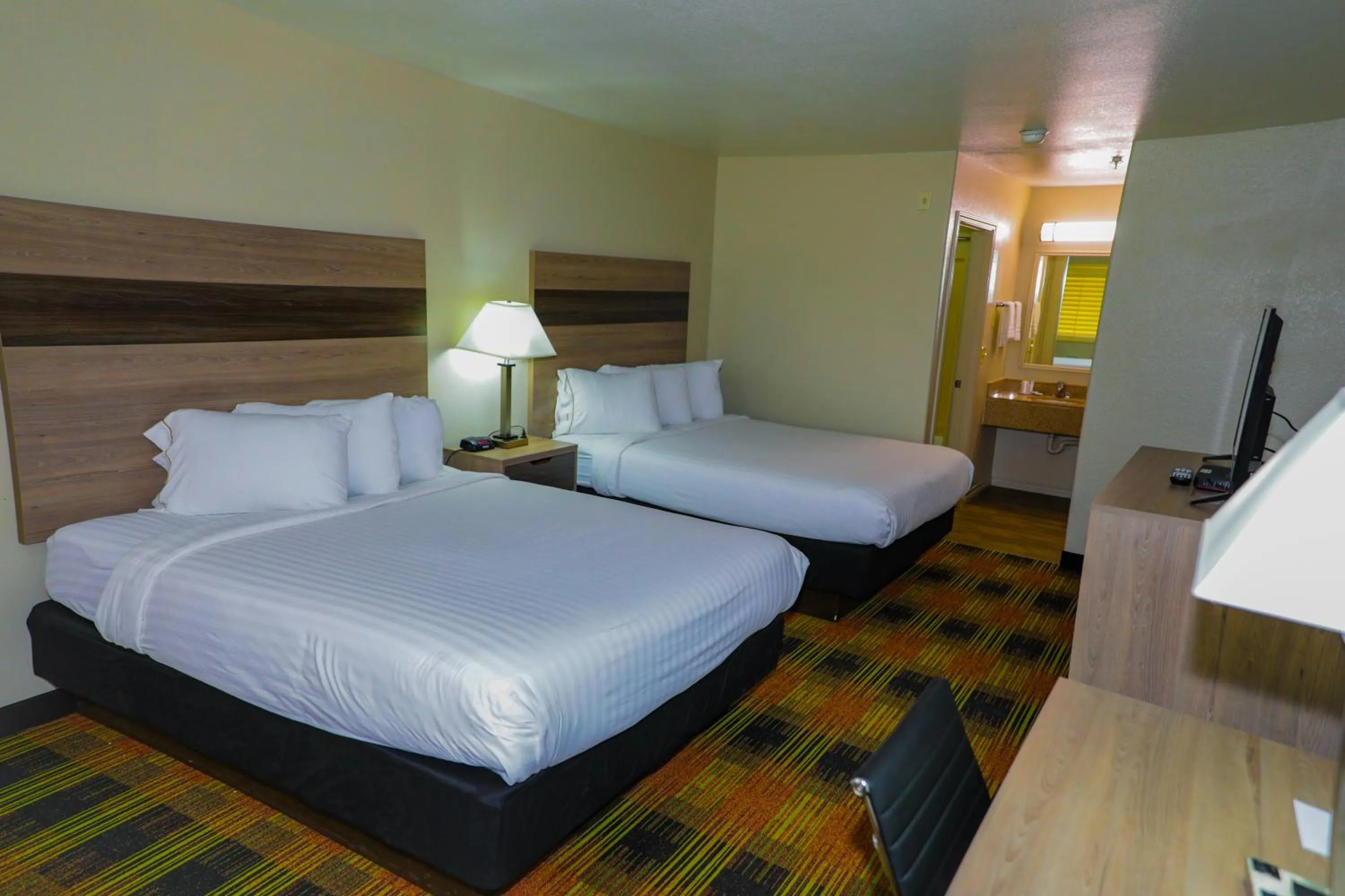 Bed in Texan Inn - Carrizo Springs