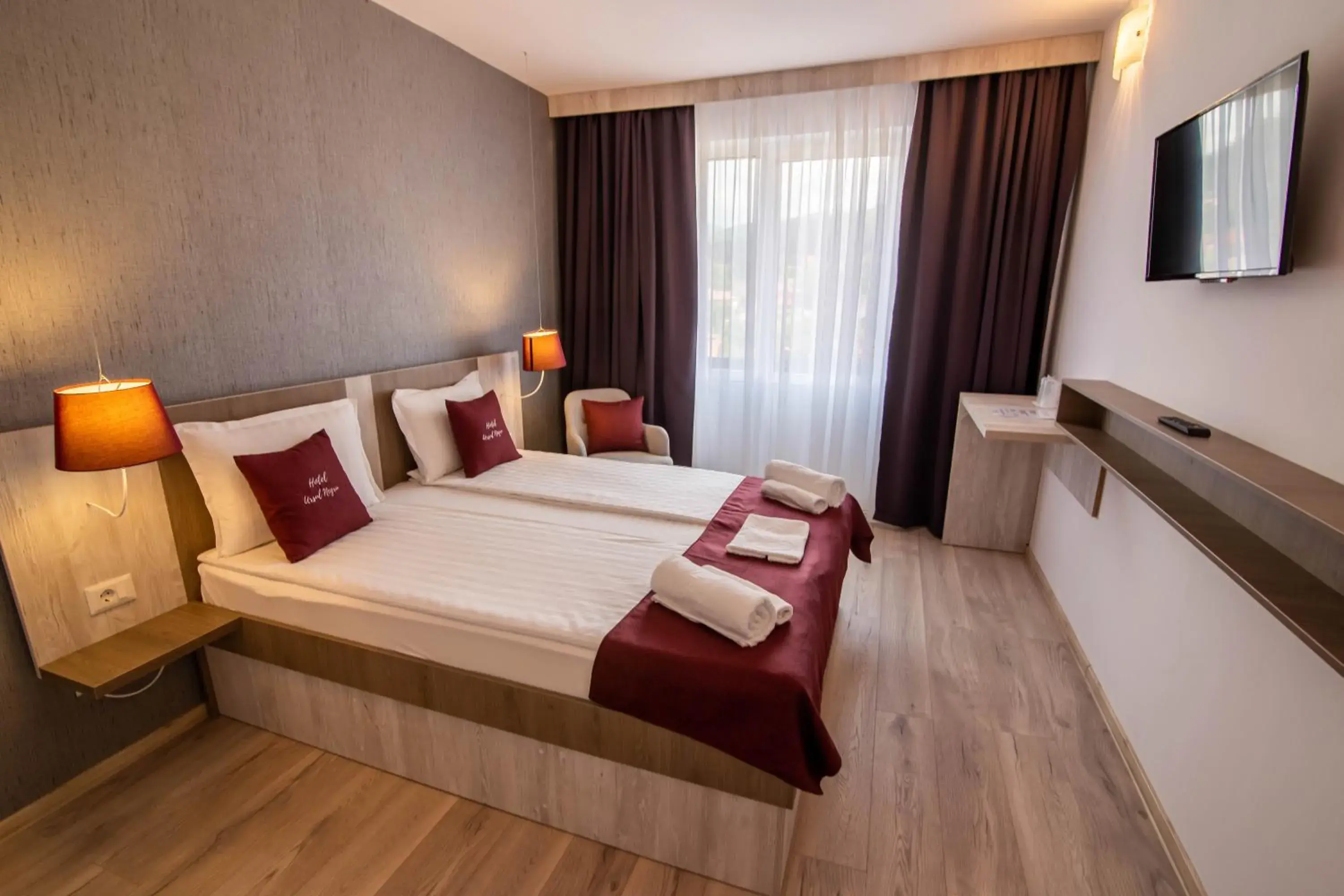 Bed in Vila Ursul Negru Bed in Vila Ursul Negru