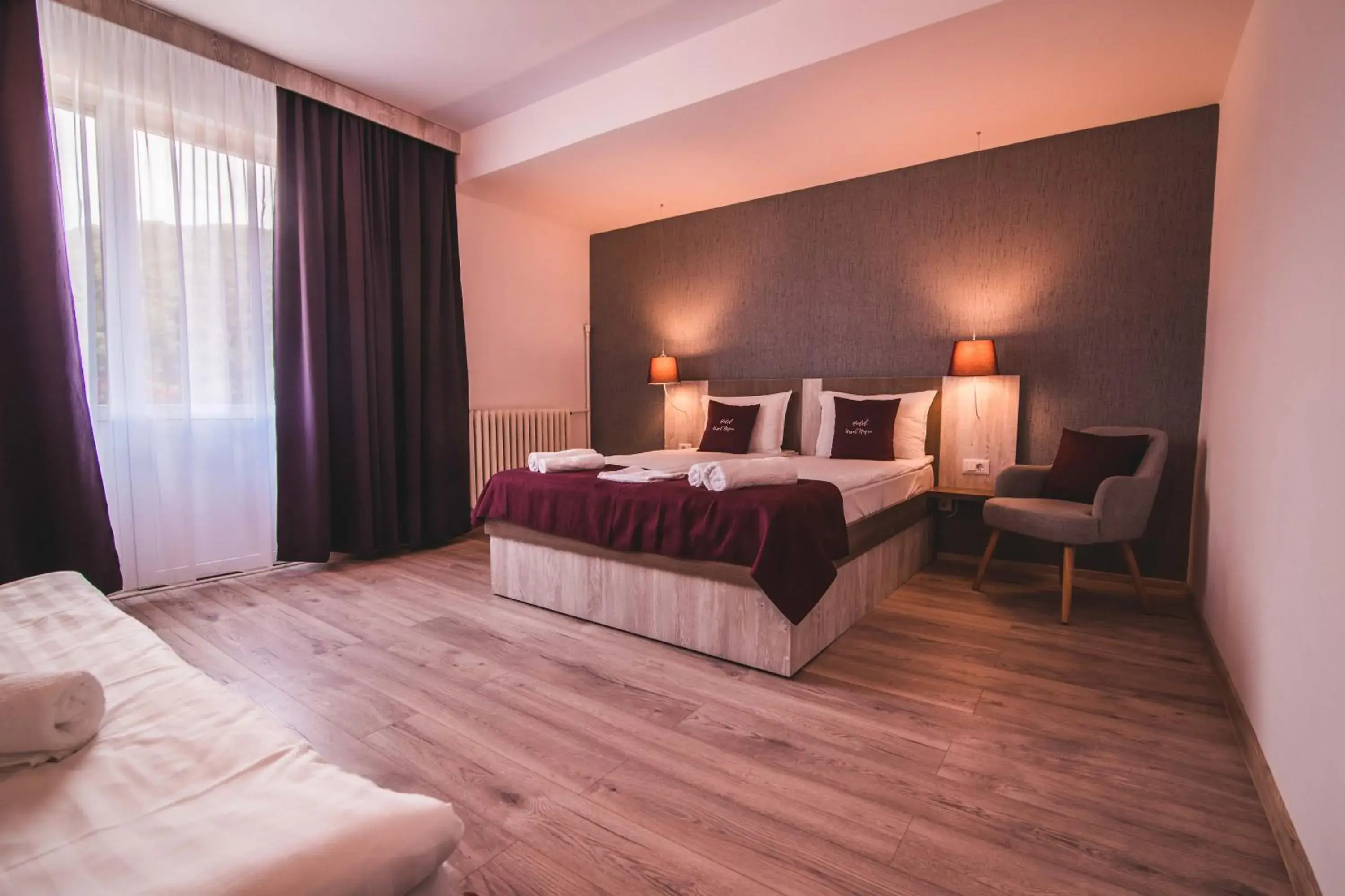 Bed in Vila Ursul Negru Bed in Vila Ursul Negru