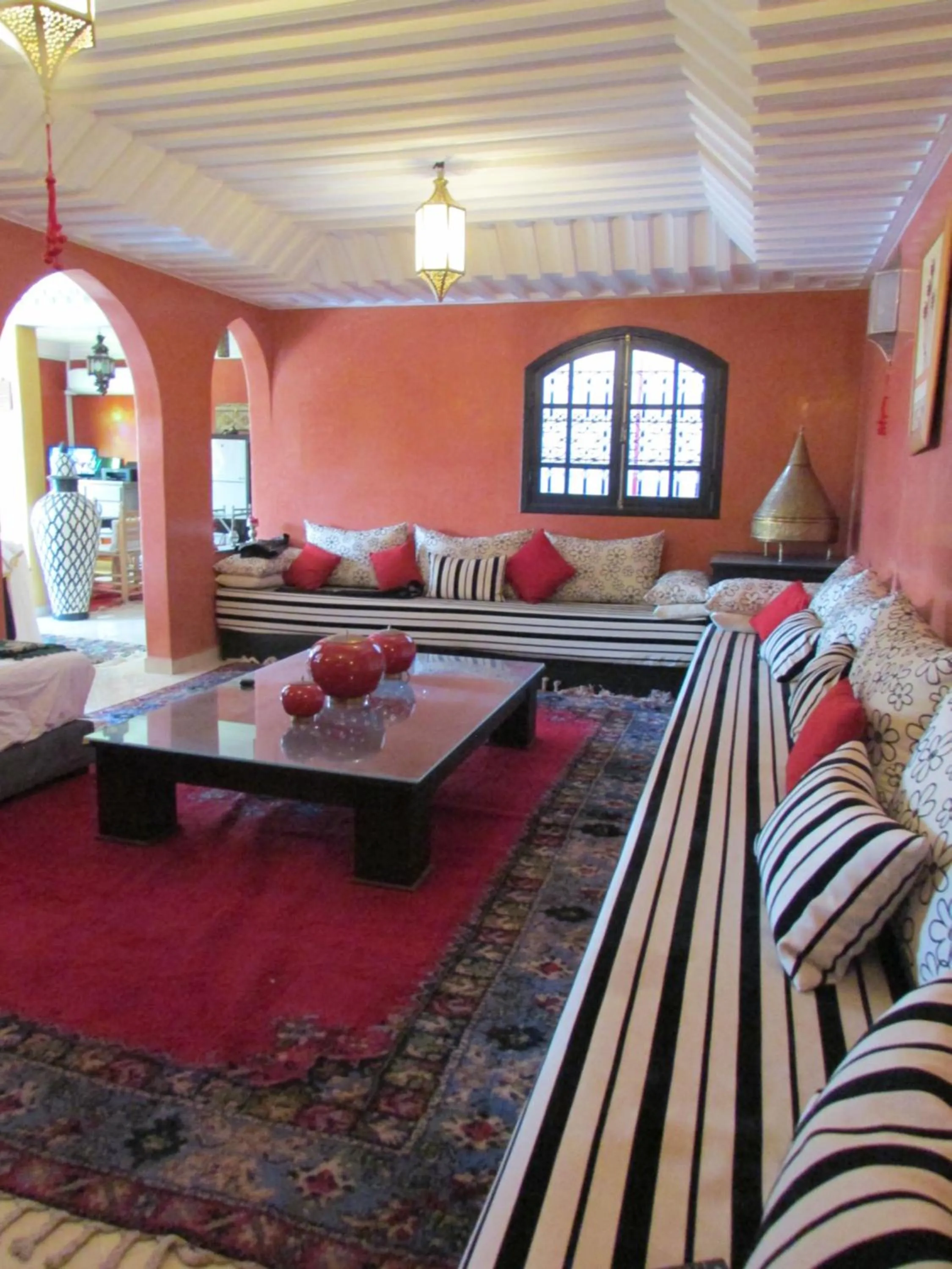 Living room, Bed in Riad Appart Arwa