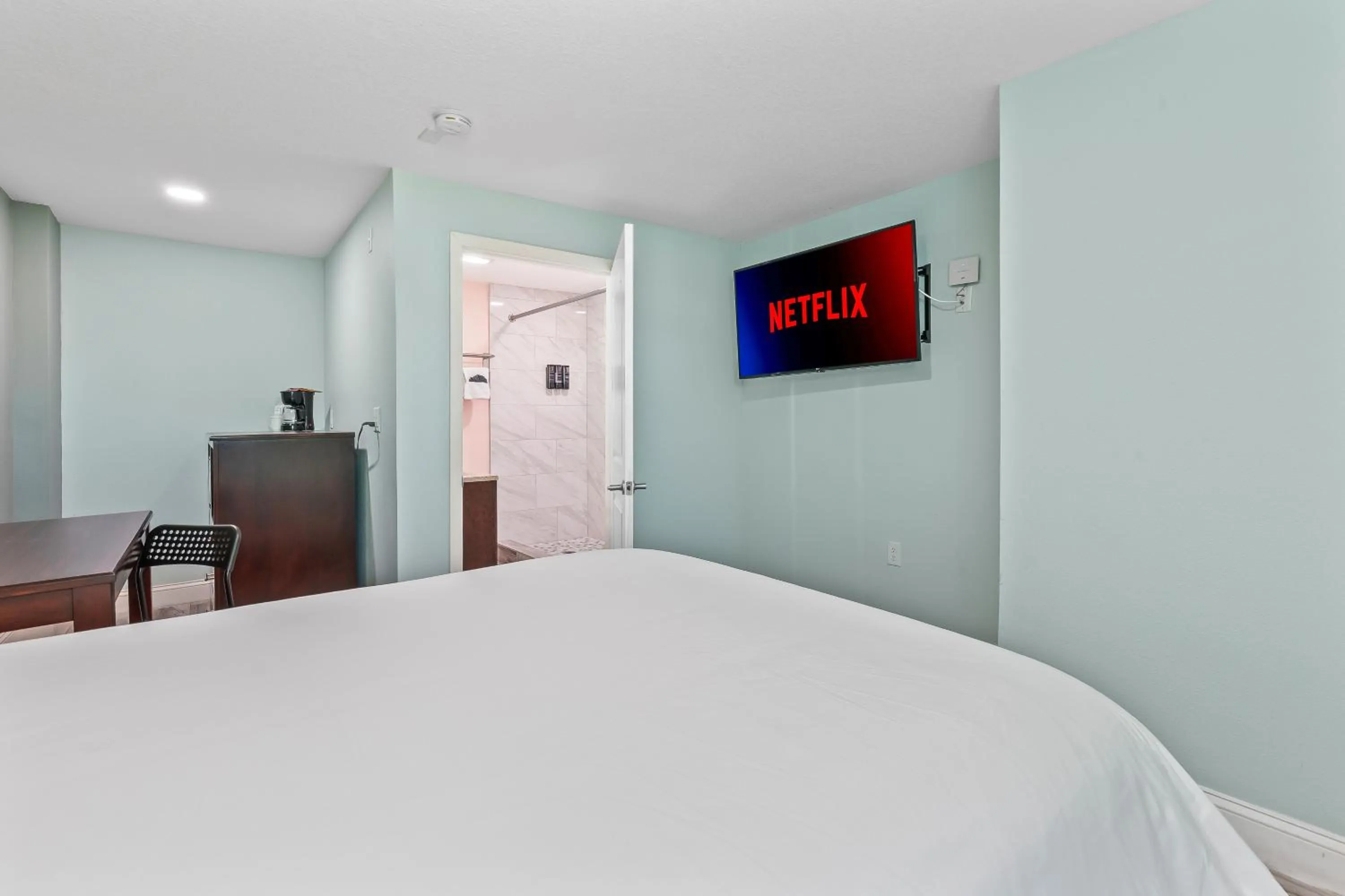 Bed in Atlantic Shores Motel