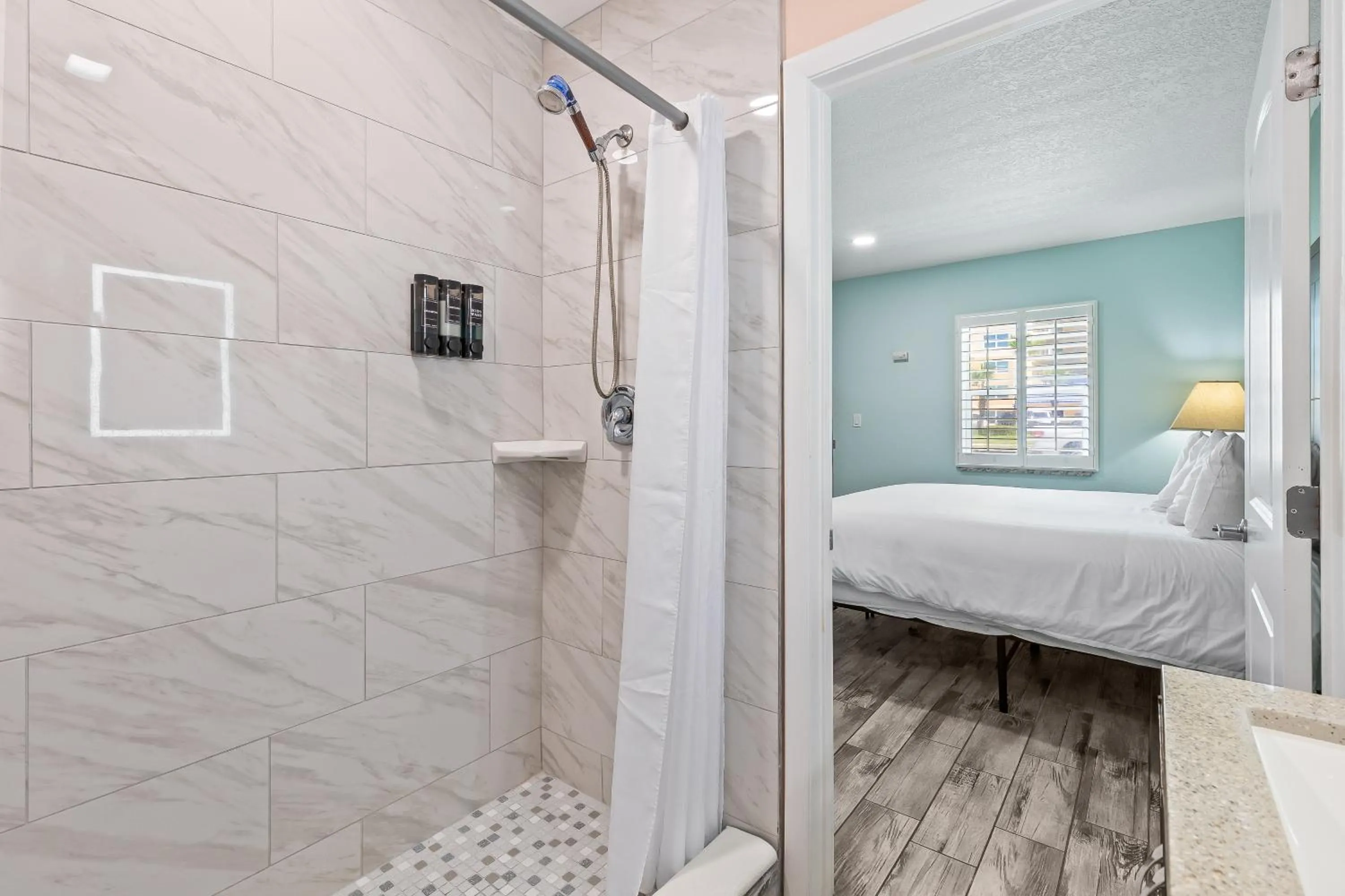 Shower, Bed in Atlantic Shores Motel