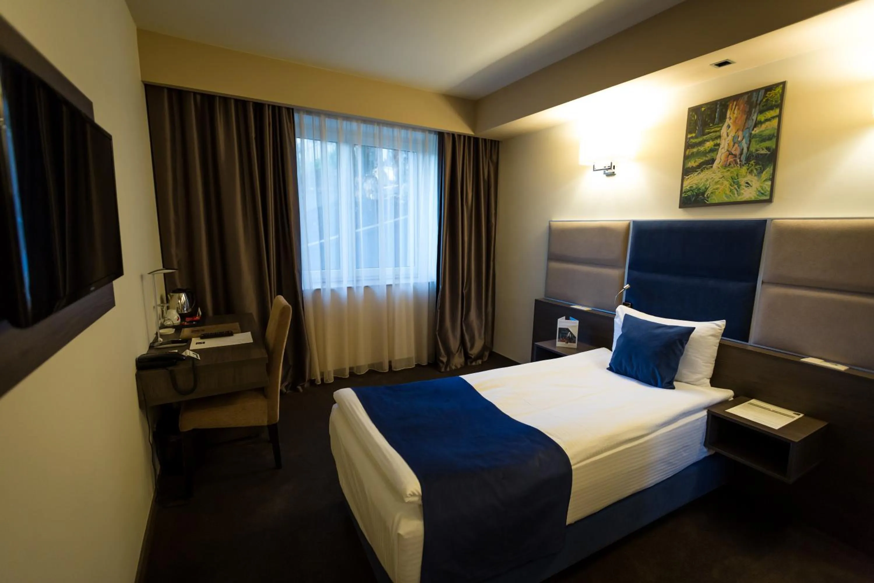 Photo of the whole room, Bed in Belfort Hotel