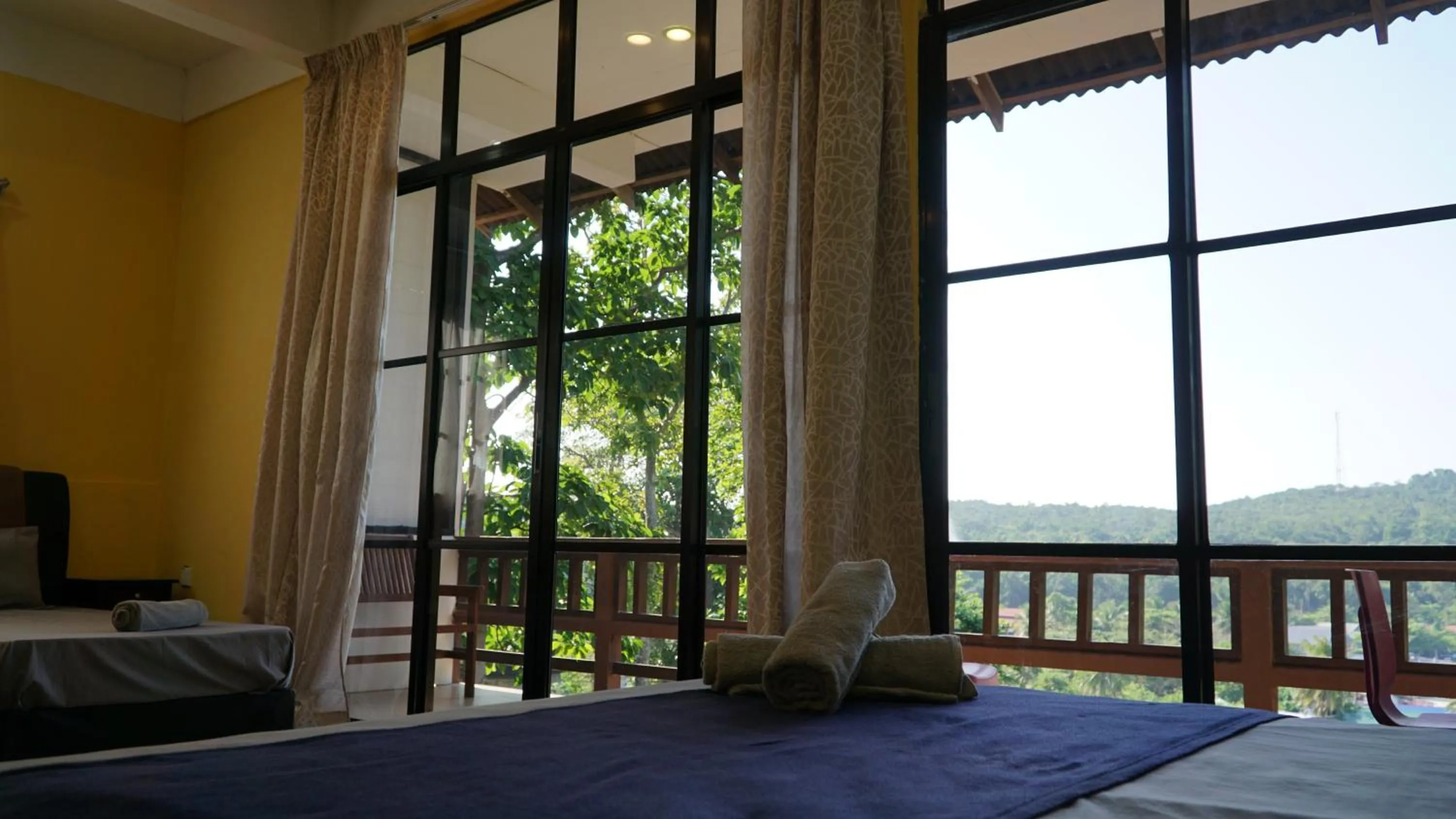 Bed in D Rock Garden Resort