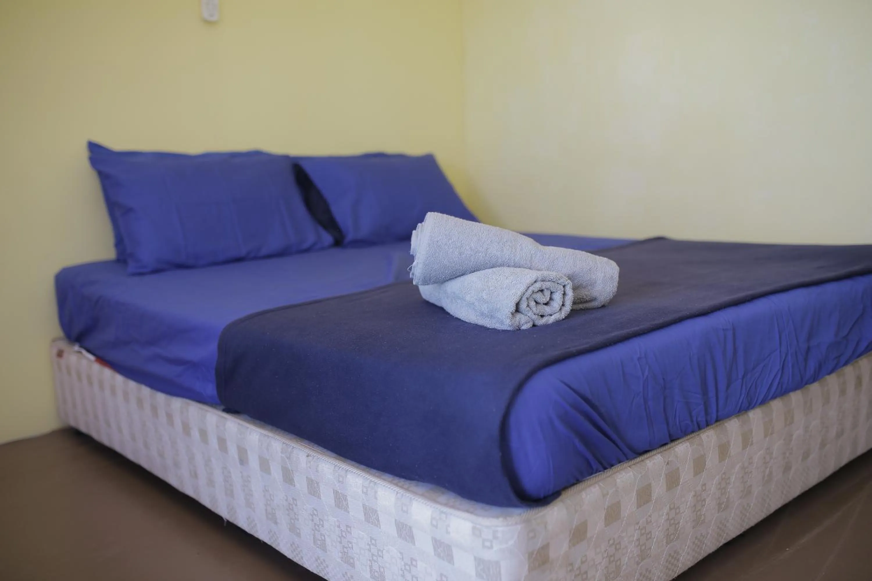 Bed in D Rock Garden Resort