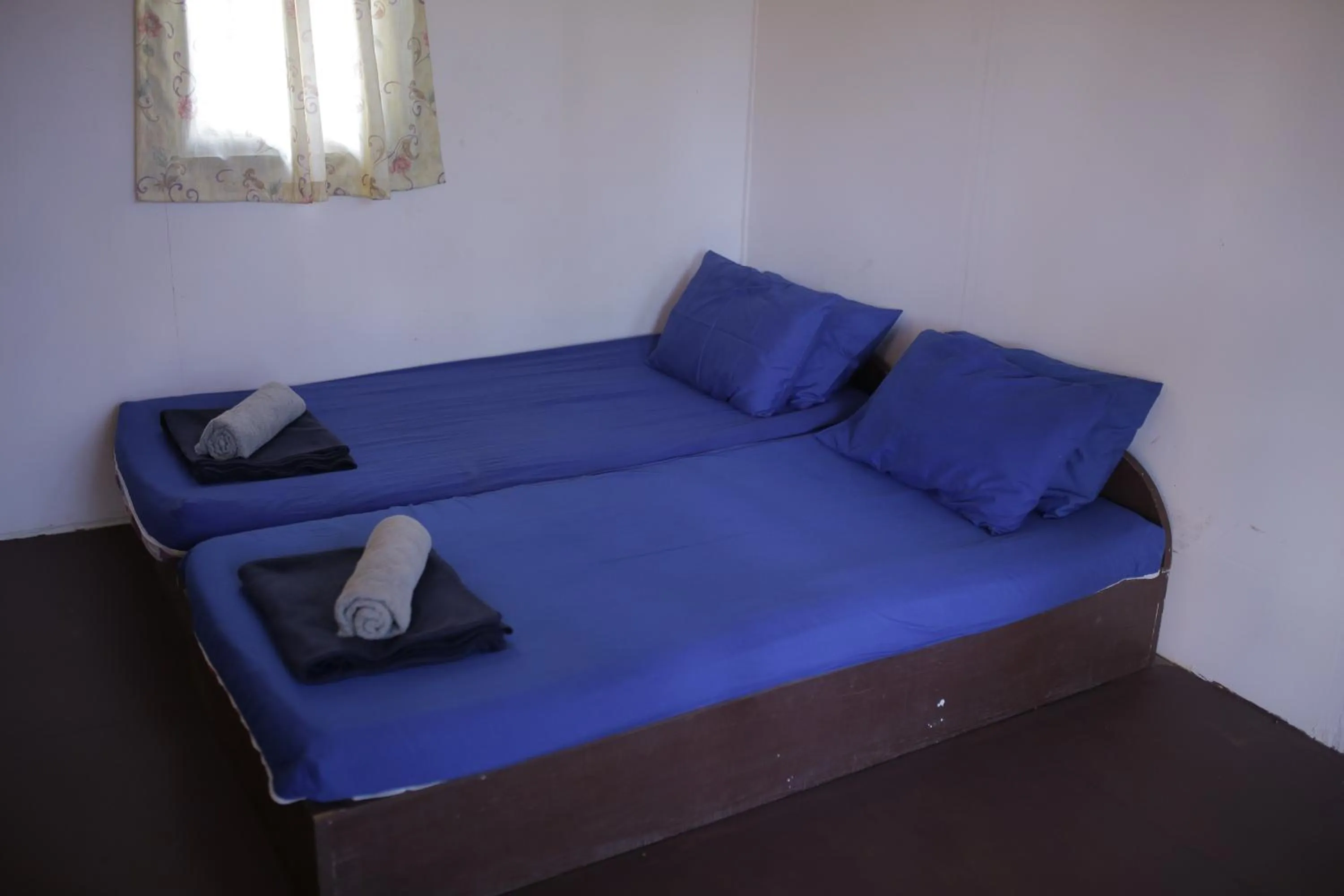 Bed in D Rock Garden Resort