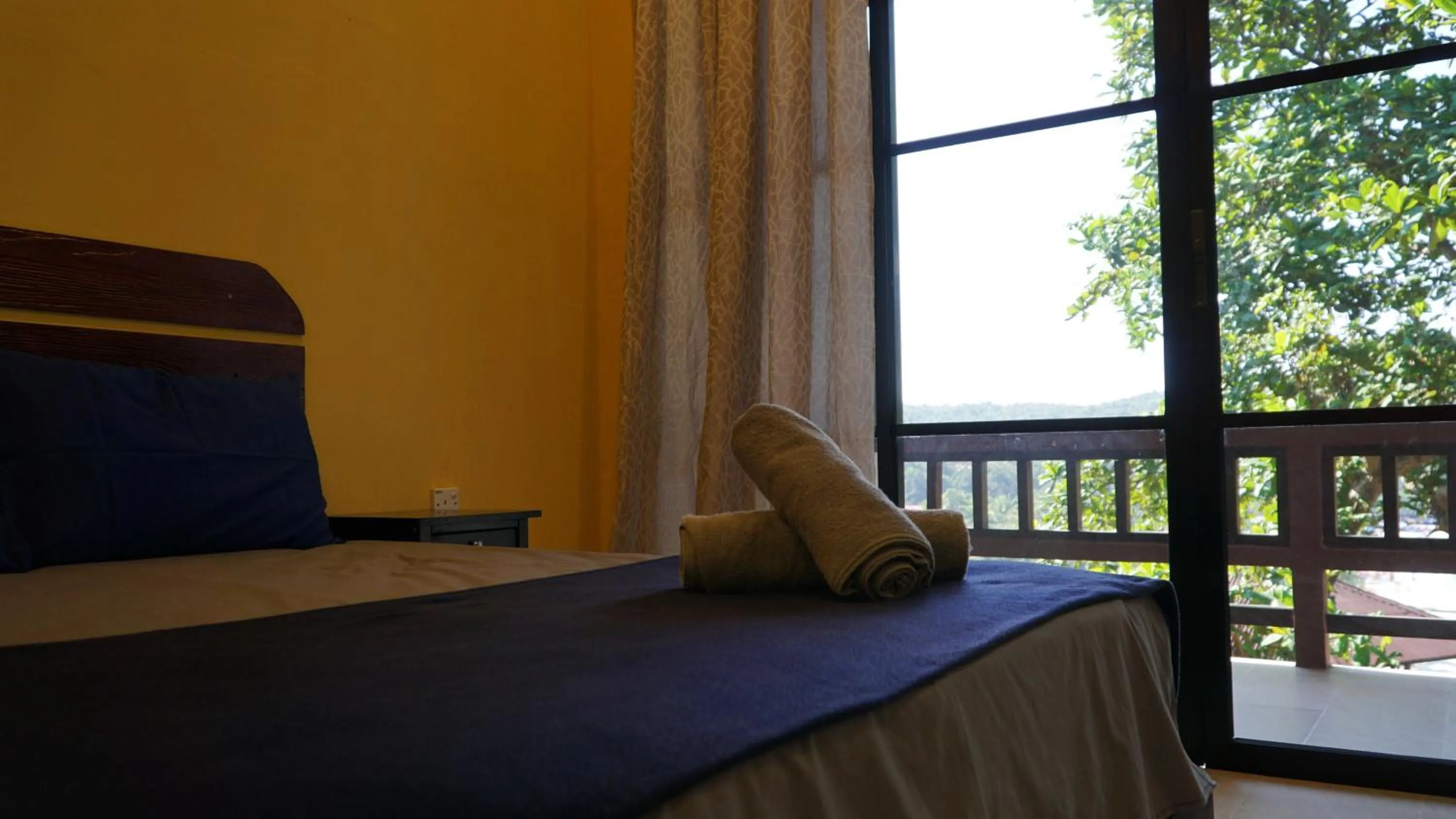 Bed in D Rock Garden Resort