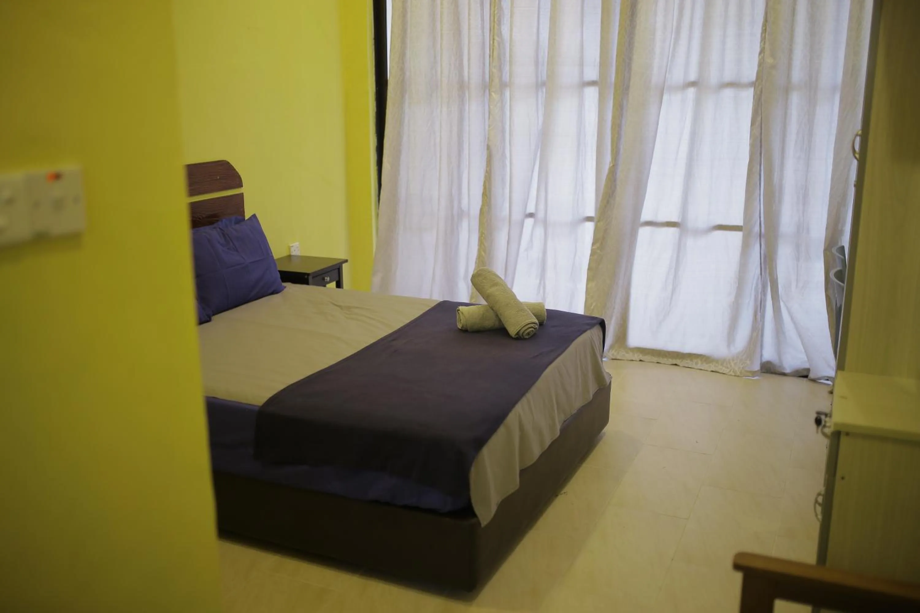 Bed in D Rock Garden Resort