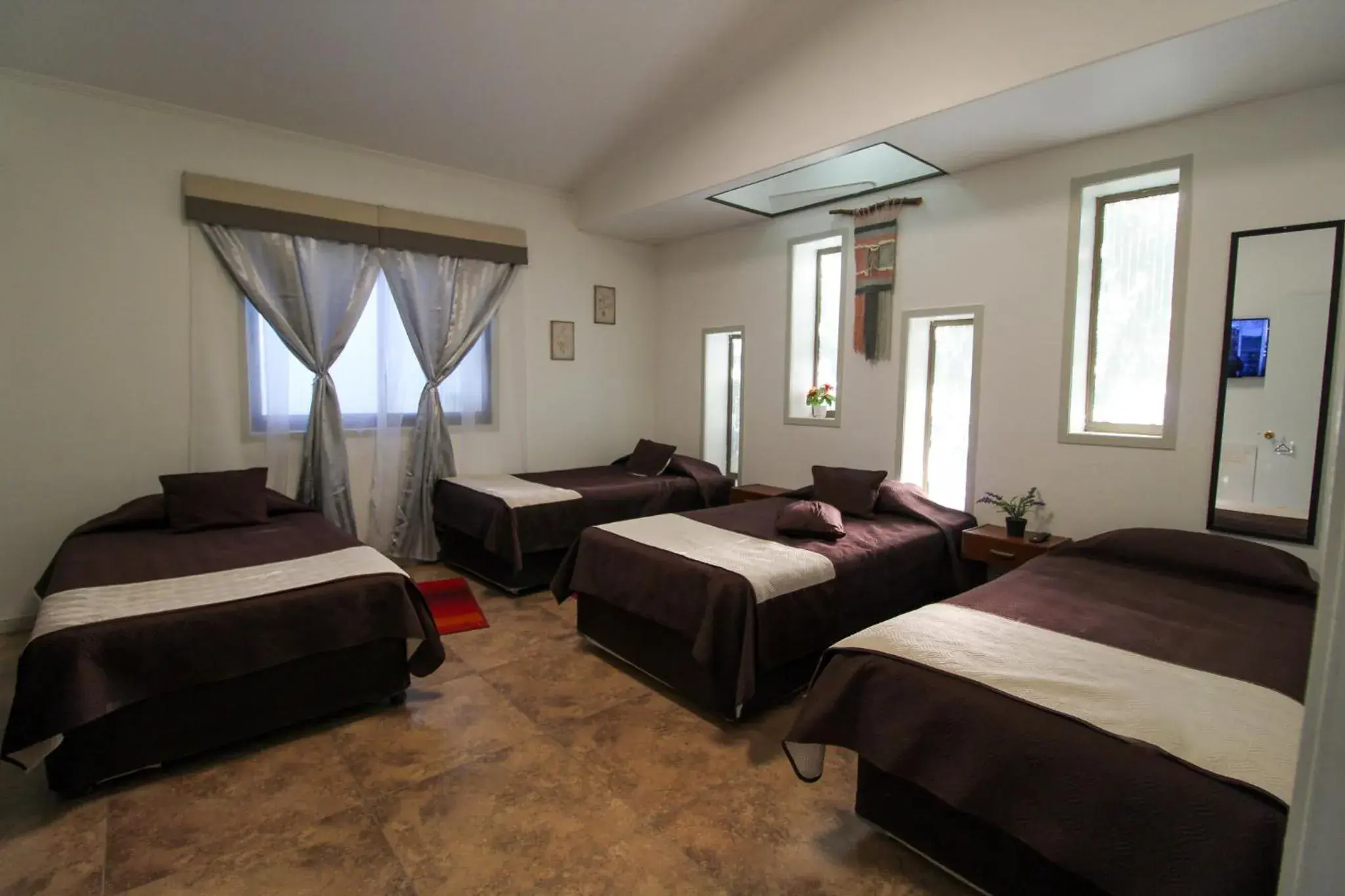 Standard Quadruple Room in Atankalama Inn Standard Quadruple Room in Atankalama Inn