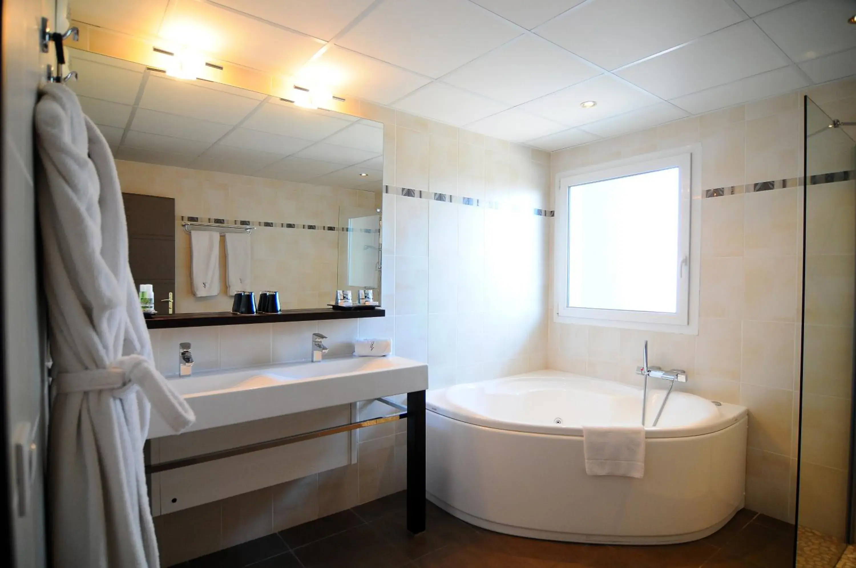 Bathroom in Logis Hôtel La Fauceille Bathroom in Logis Hôtel La Fauceille