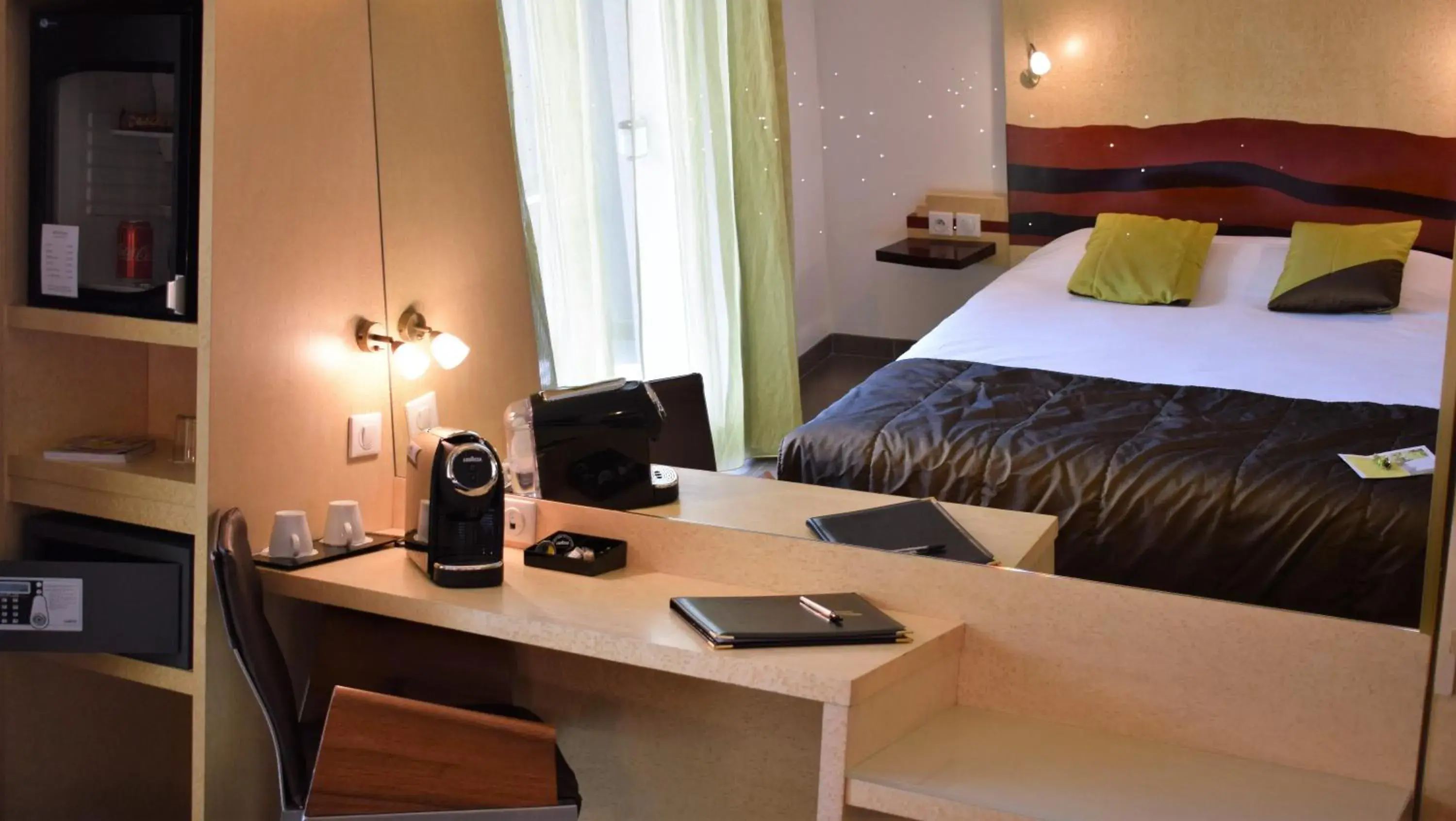 Coffee/tea facilities, Bed in Logis Hôtel La Fauceille Coffee/tea facilities, Bed in Logis Hôtel La Fauceille