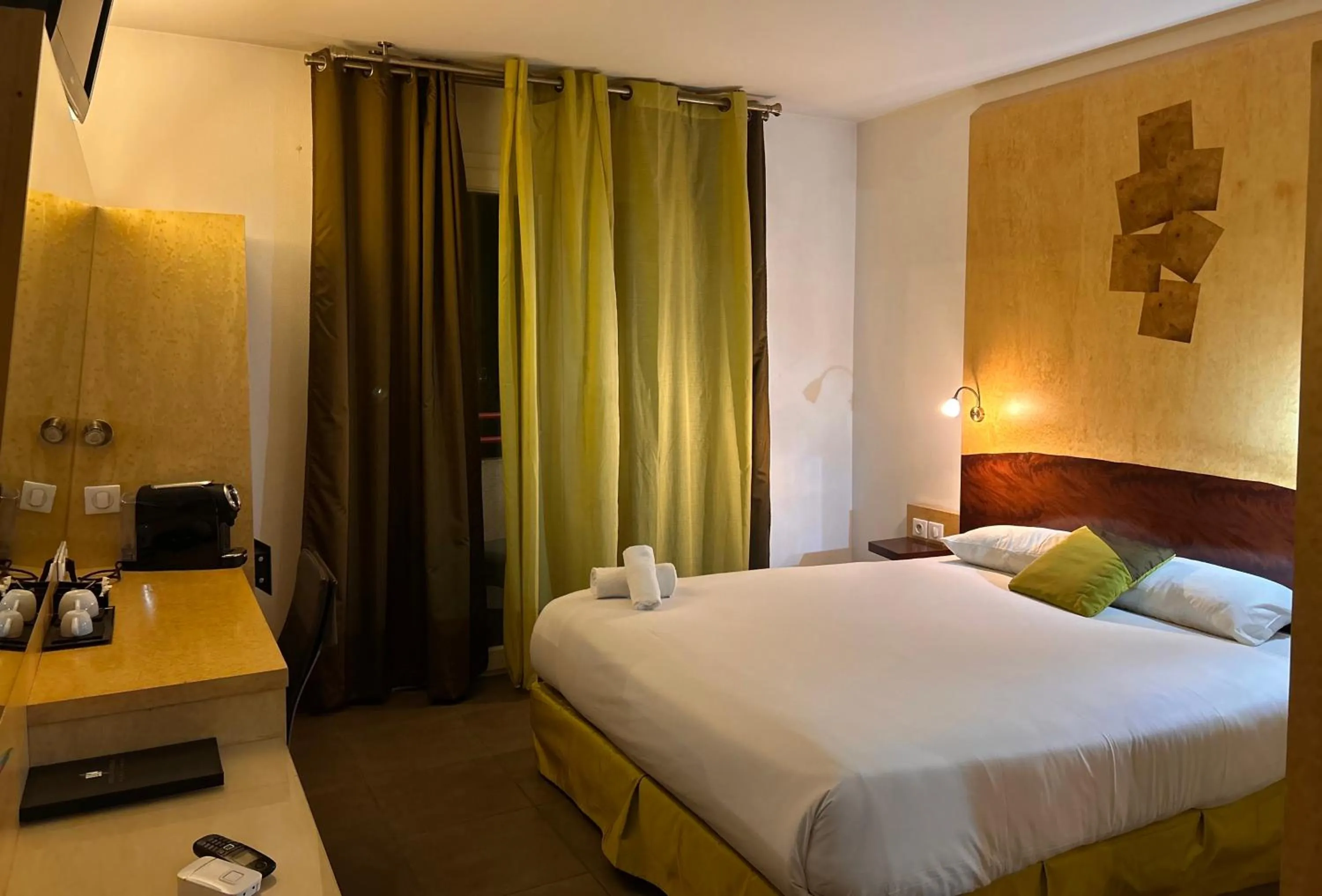 Bed in Logis Hôtel La Fauceille