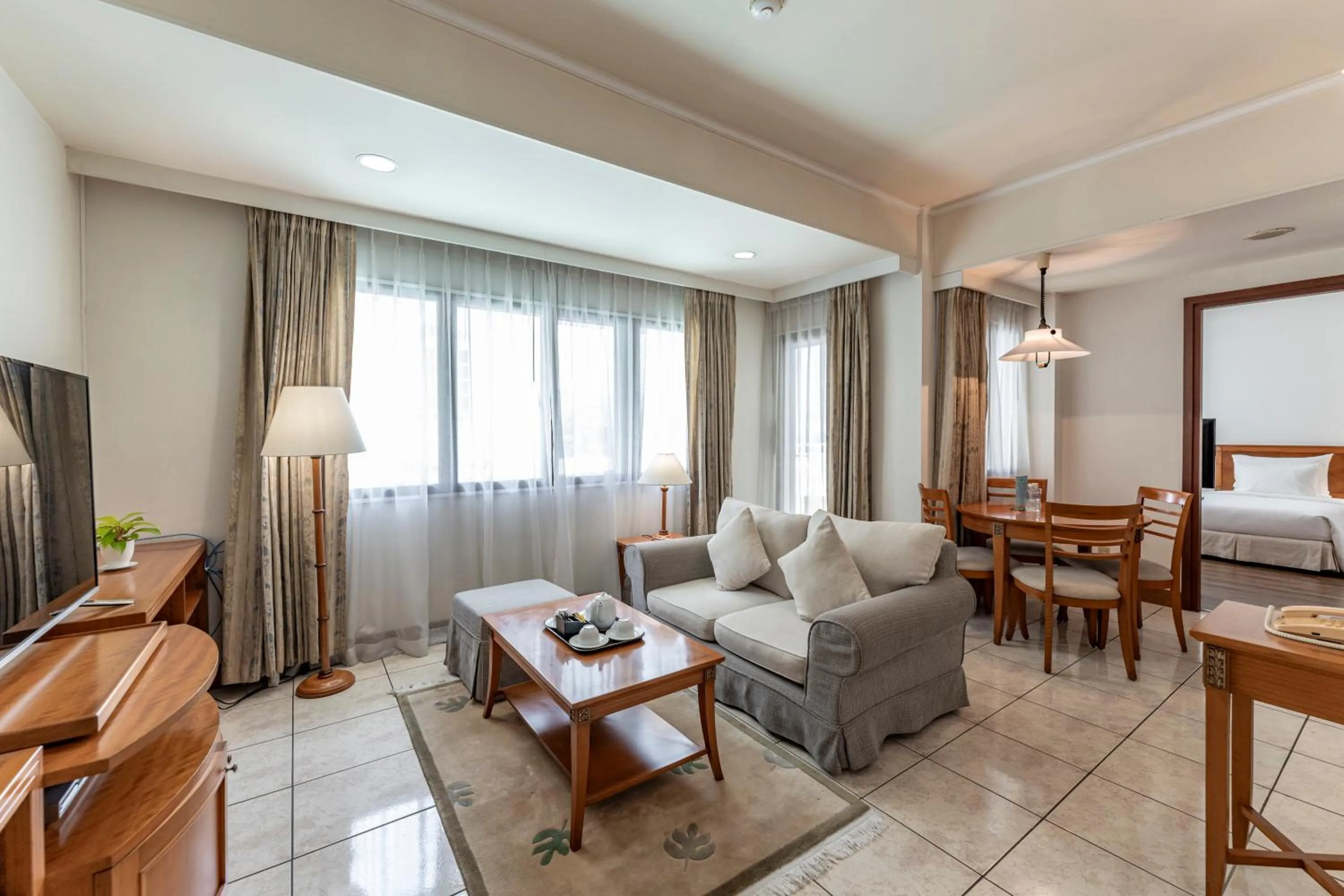 TV and multimedia, Bed in Garden View Court Suites Ho Chi Minh City