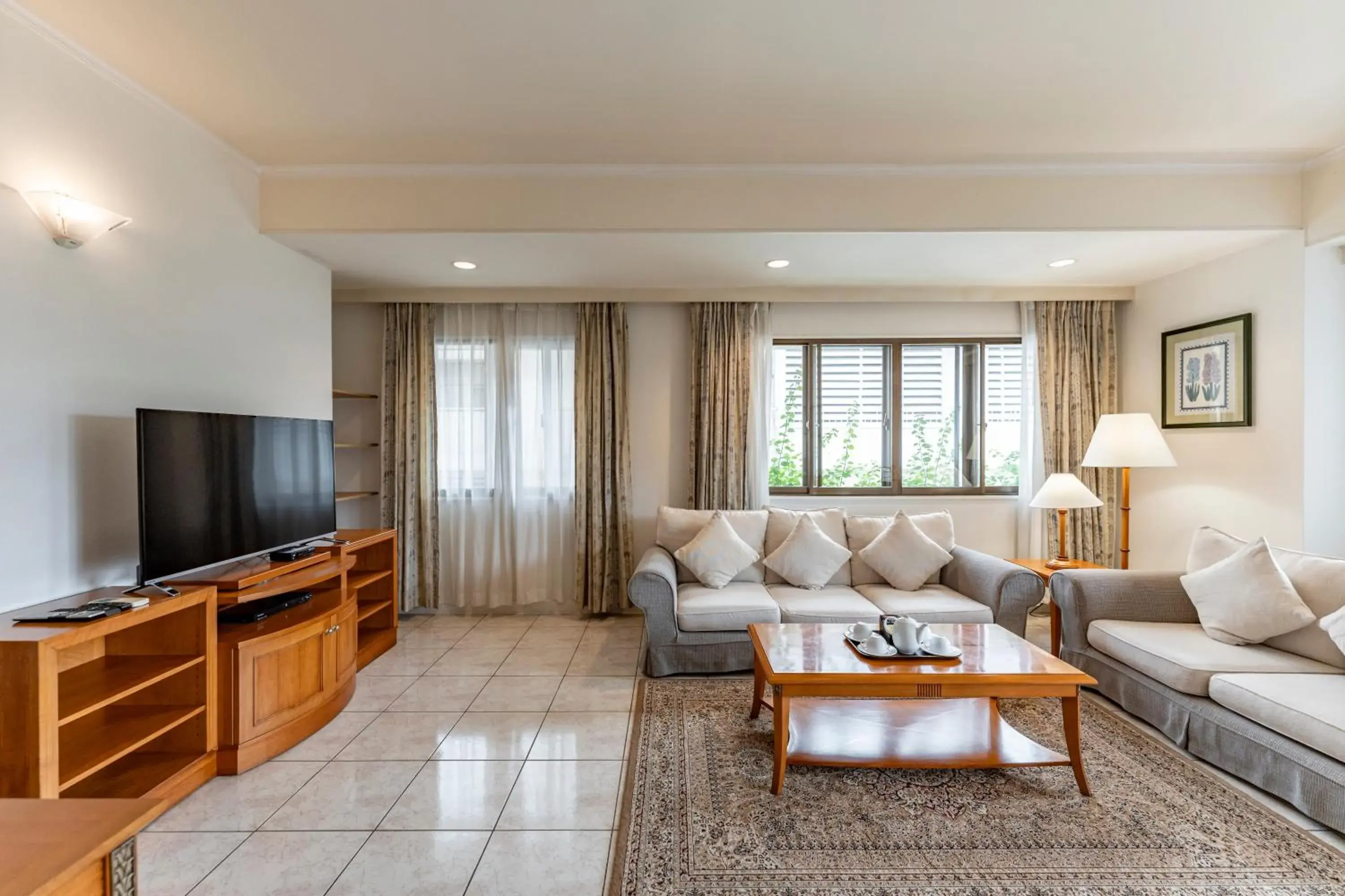 Communal lounge/ TV room in Garden View Court Suites Ho Chi Minh City Communal lounge/ TV room in Garden View Court Suites Ho Chi Minh City