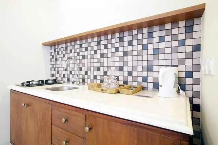 Kitchen or kitchenette in Seminyak Lagoon All Suites Hotel