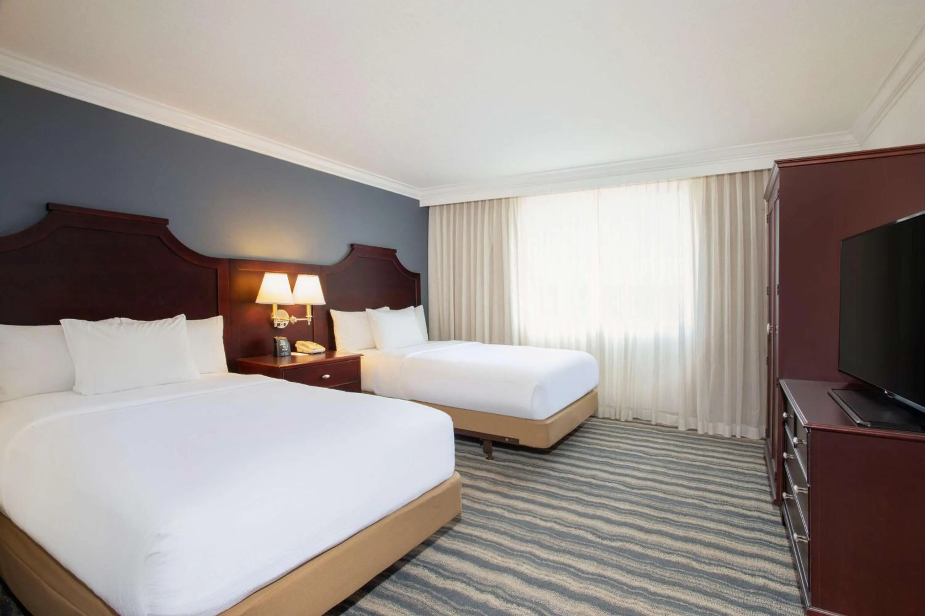 Bedroom, Bed in Embassy Suites by Hilton Tampa Brandon