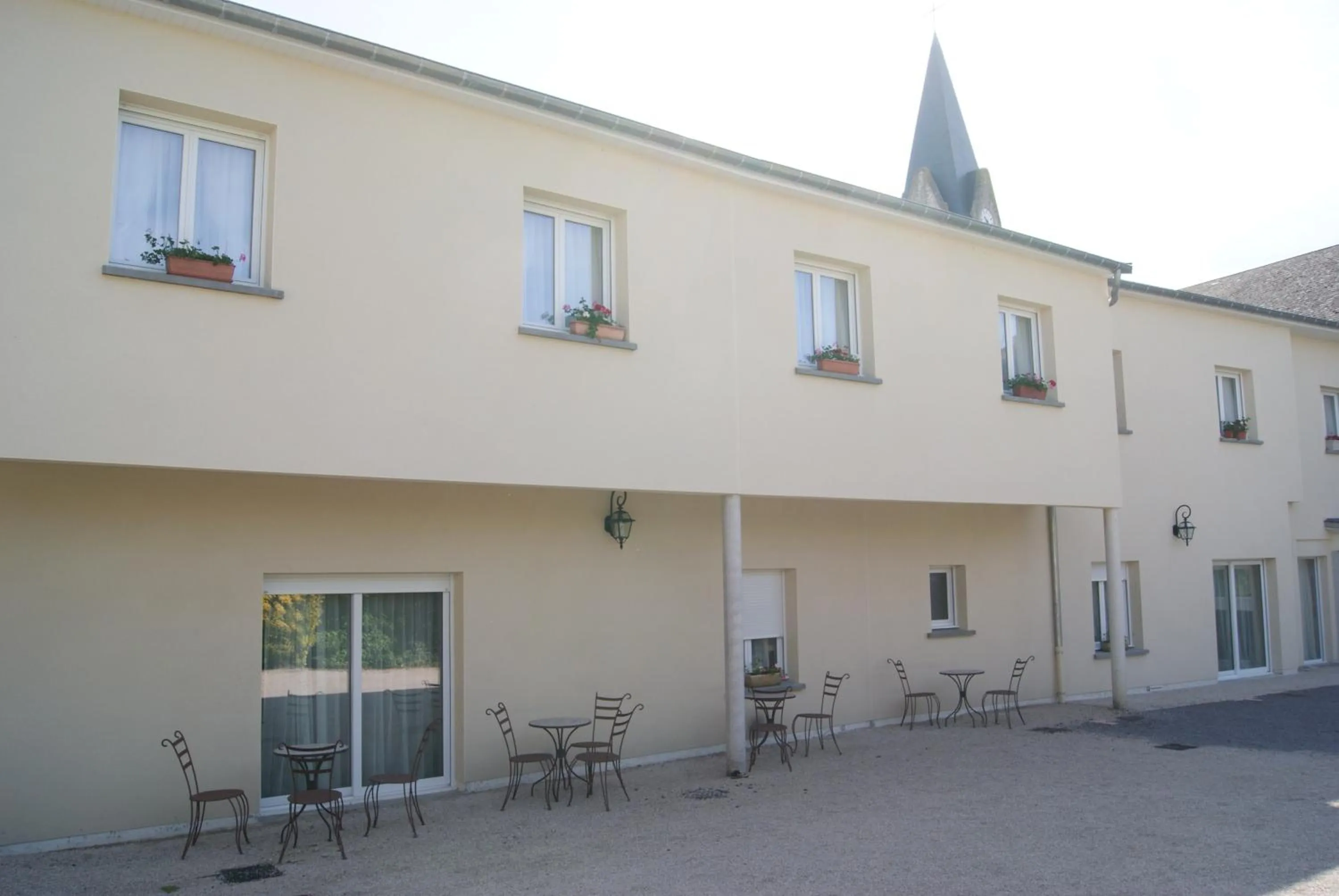 Garden view in Logis Hôtel & Restaurant du Chemin des Dames