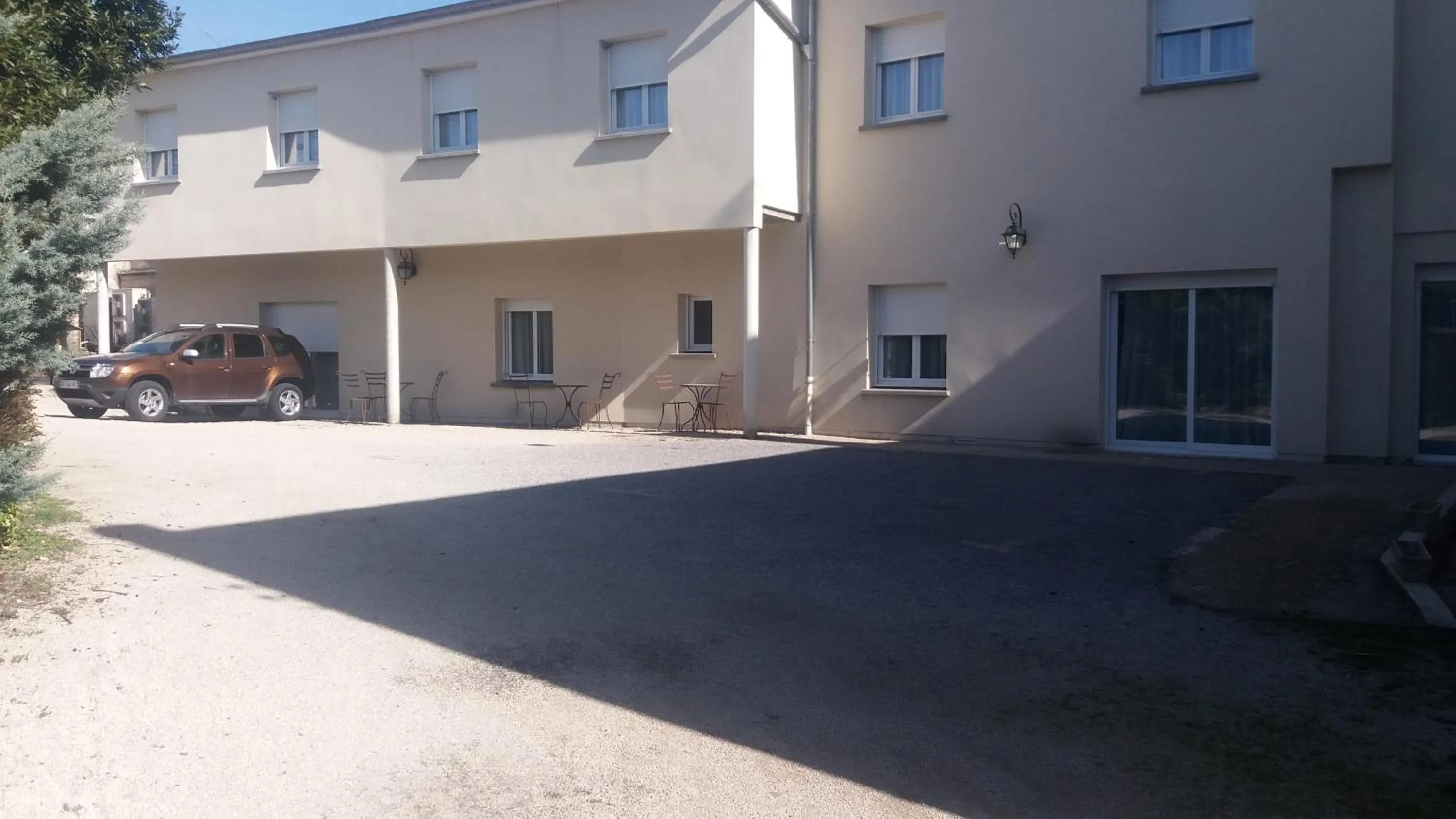 Garden view in Logis Hôtel & Restaurant du Chemin des Dames