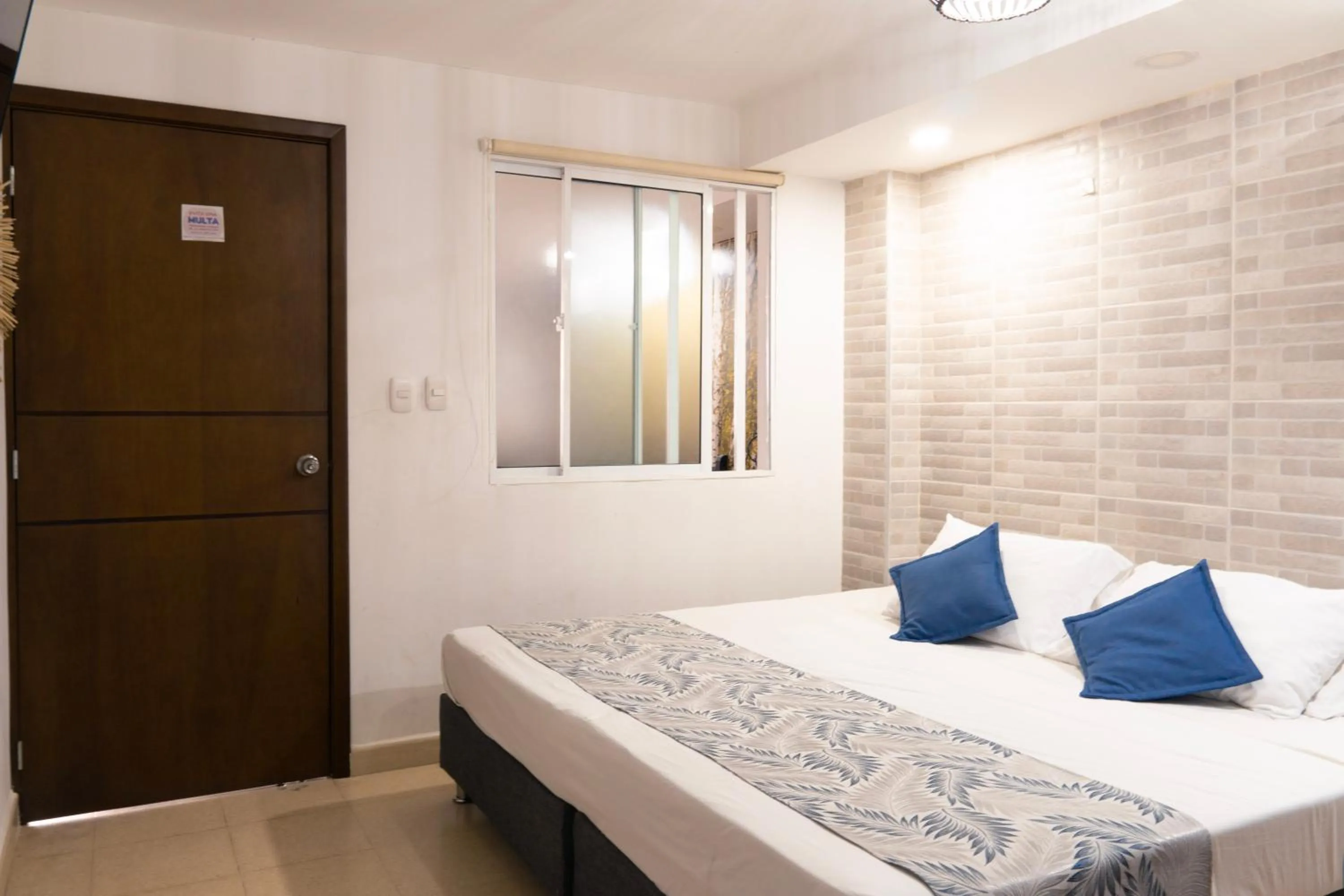 Bed in Hotel Riviera Plaza