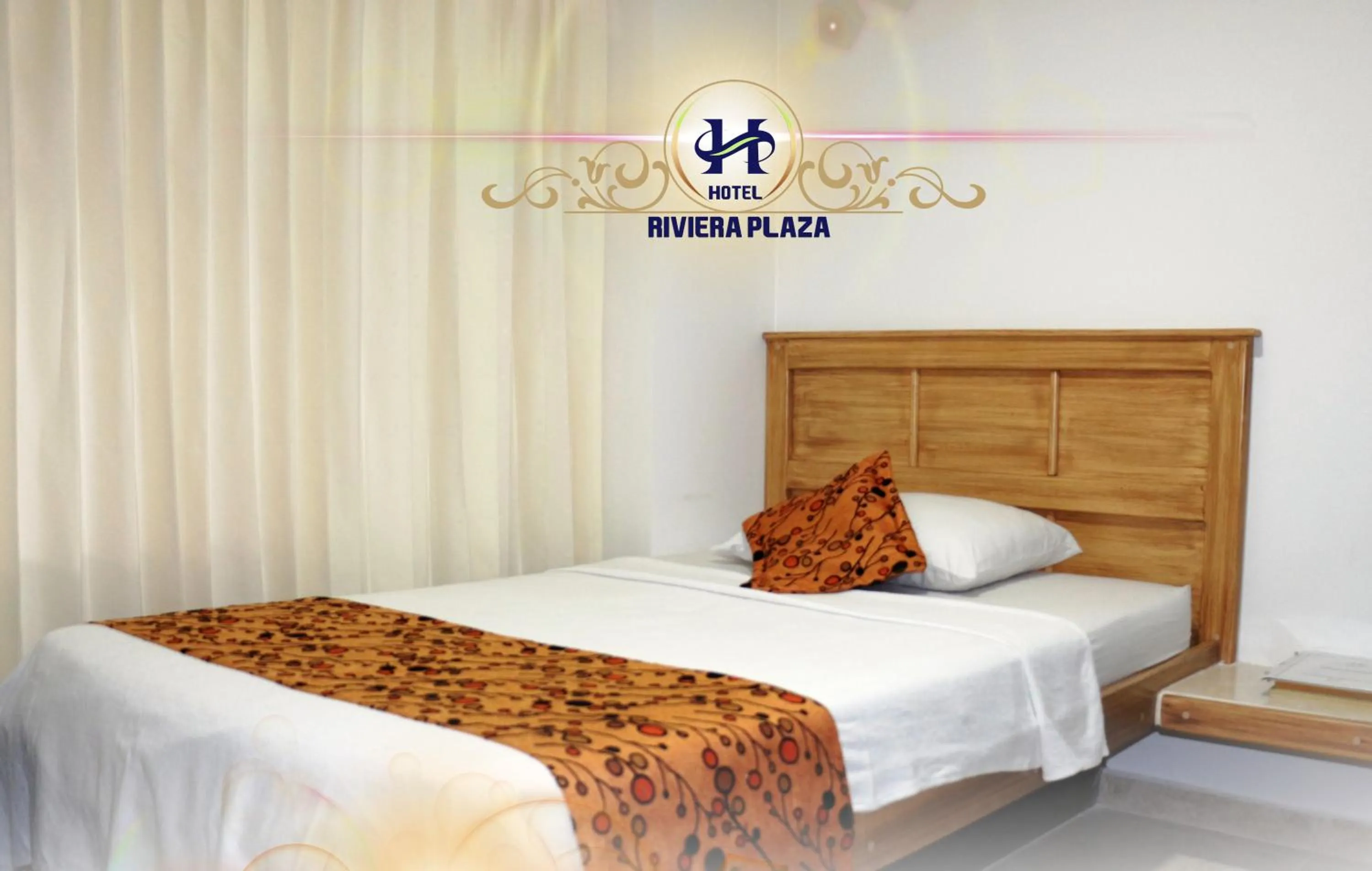 Bed in Hotel Riviera Plaza