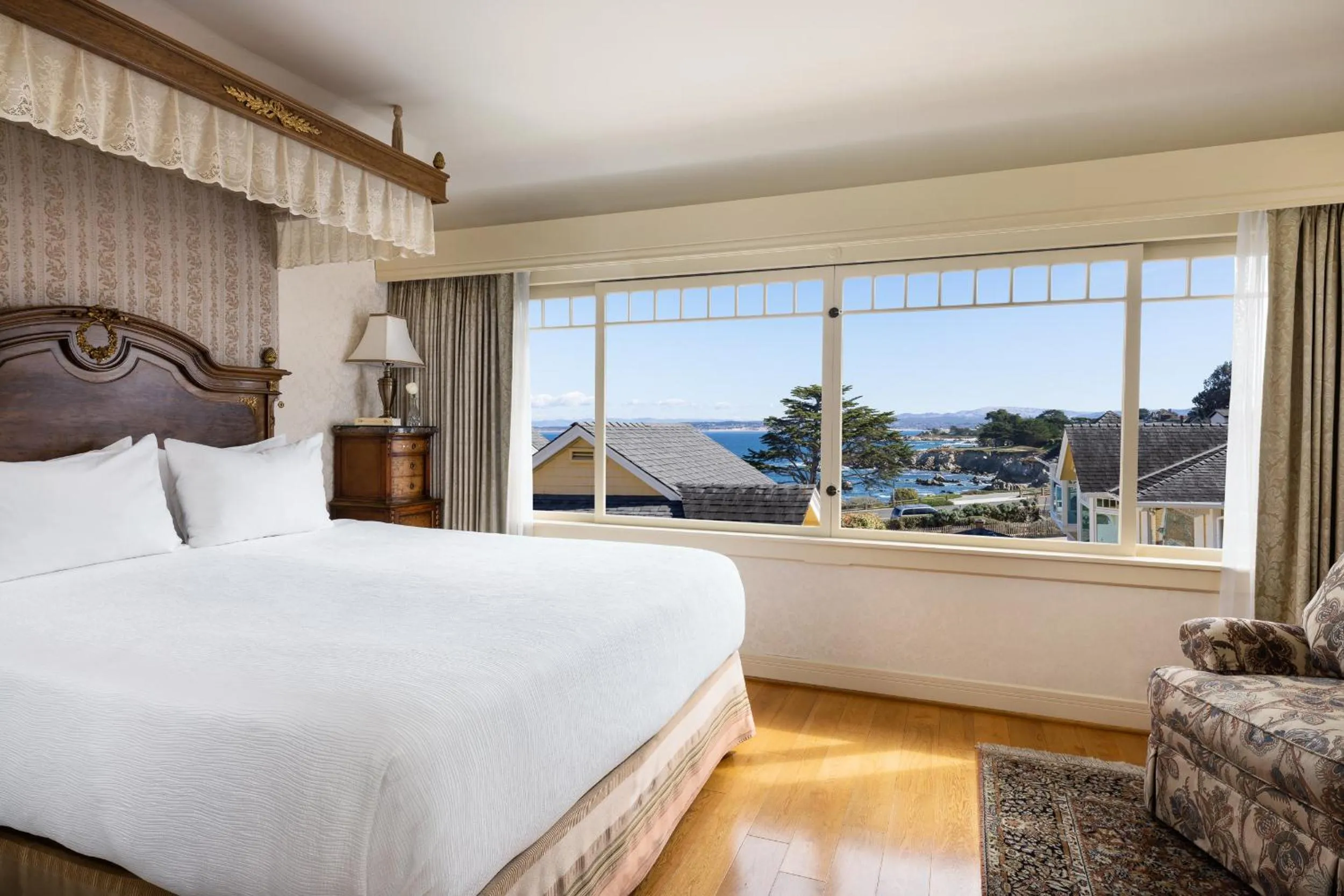 Seating area, Bed in Seven Gables Inn on Monterey Bay, A Kirkwood Collection Hotel
