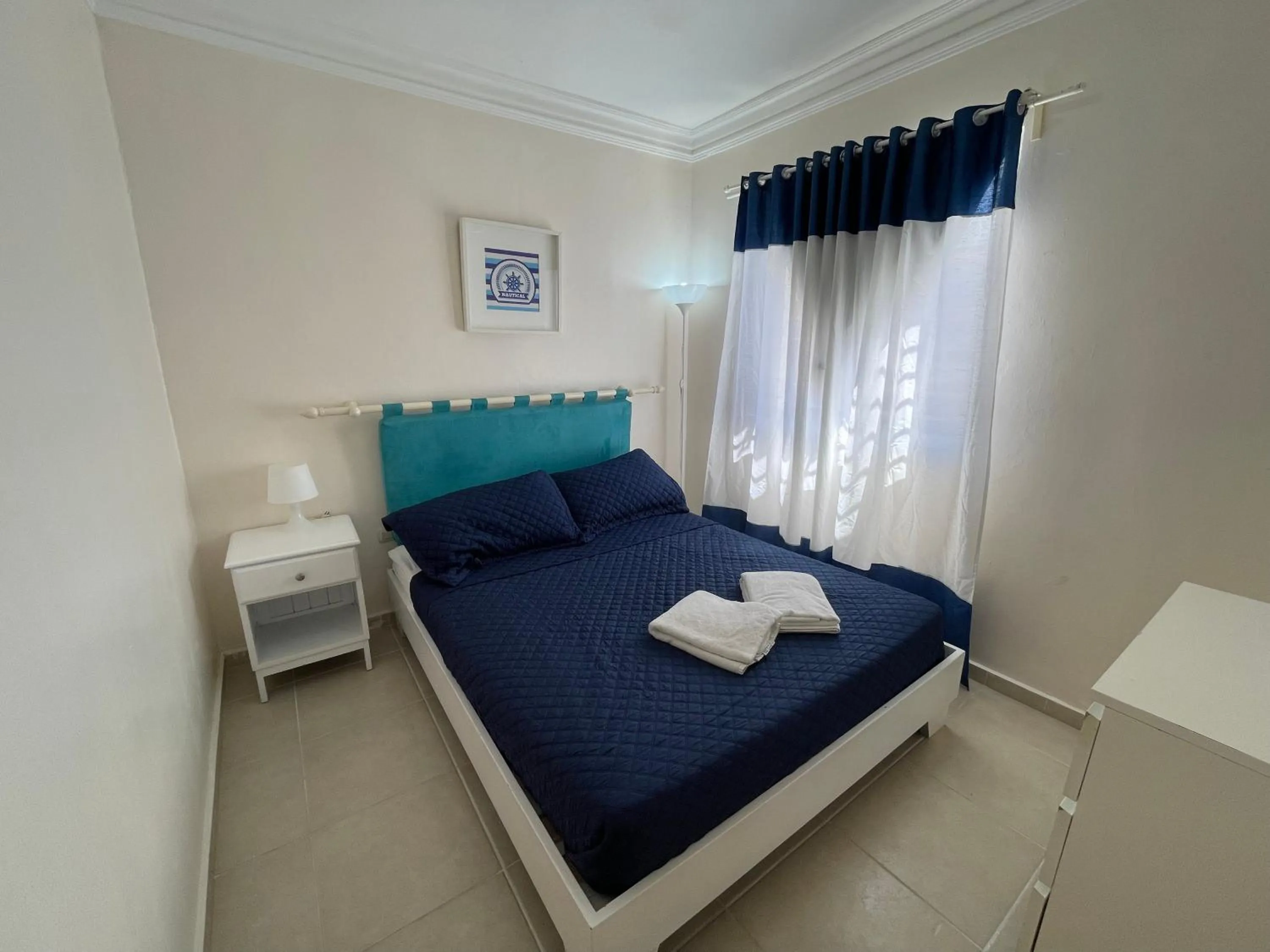 Photo of the whole room, Bed in Karimar Beach Condo Hotel