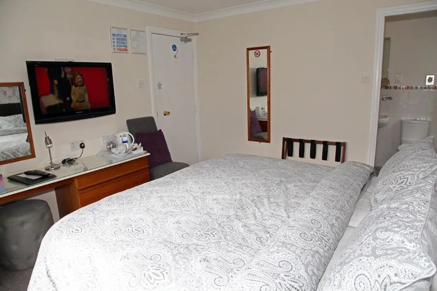 Bed in The Hinton Guest House