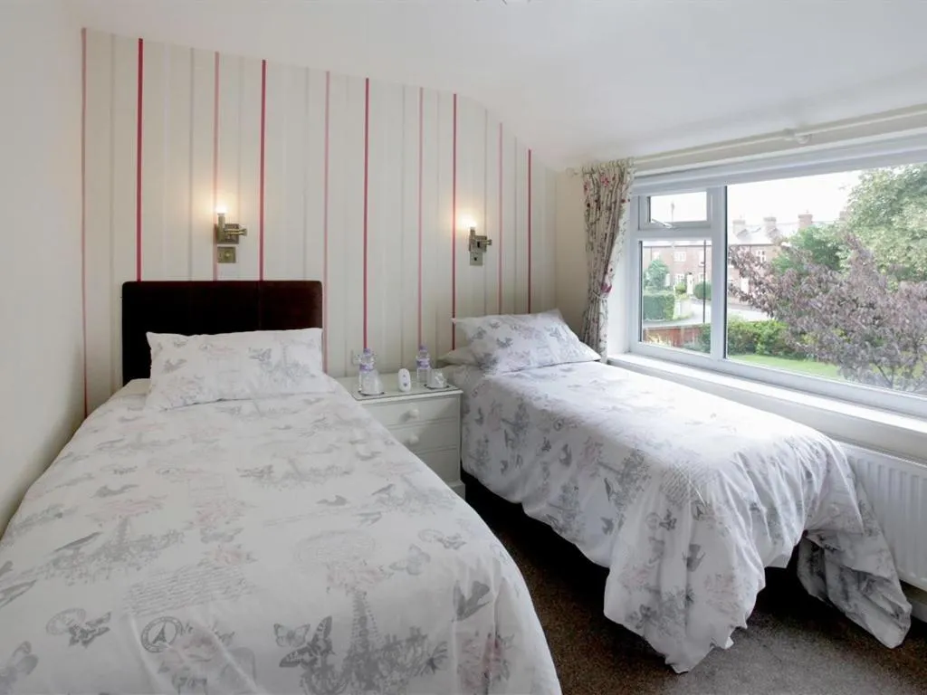 Bed in The Hinton Guest House