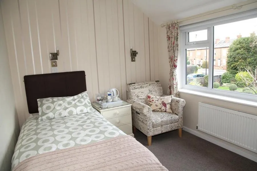 Bed in The Hinton Guest House