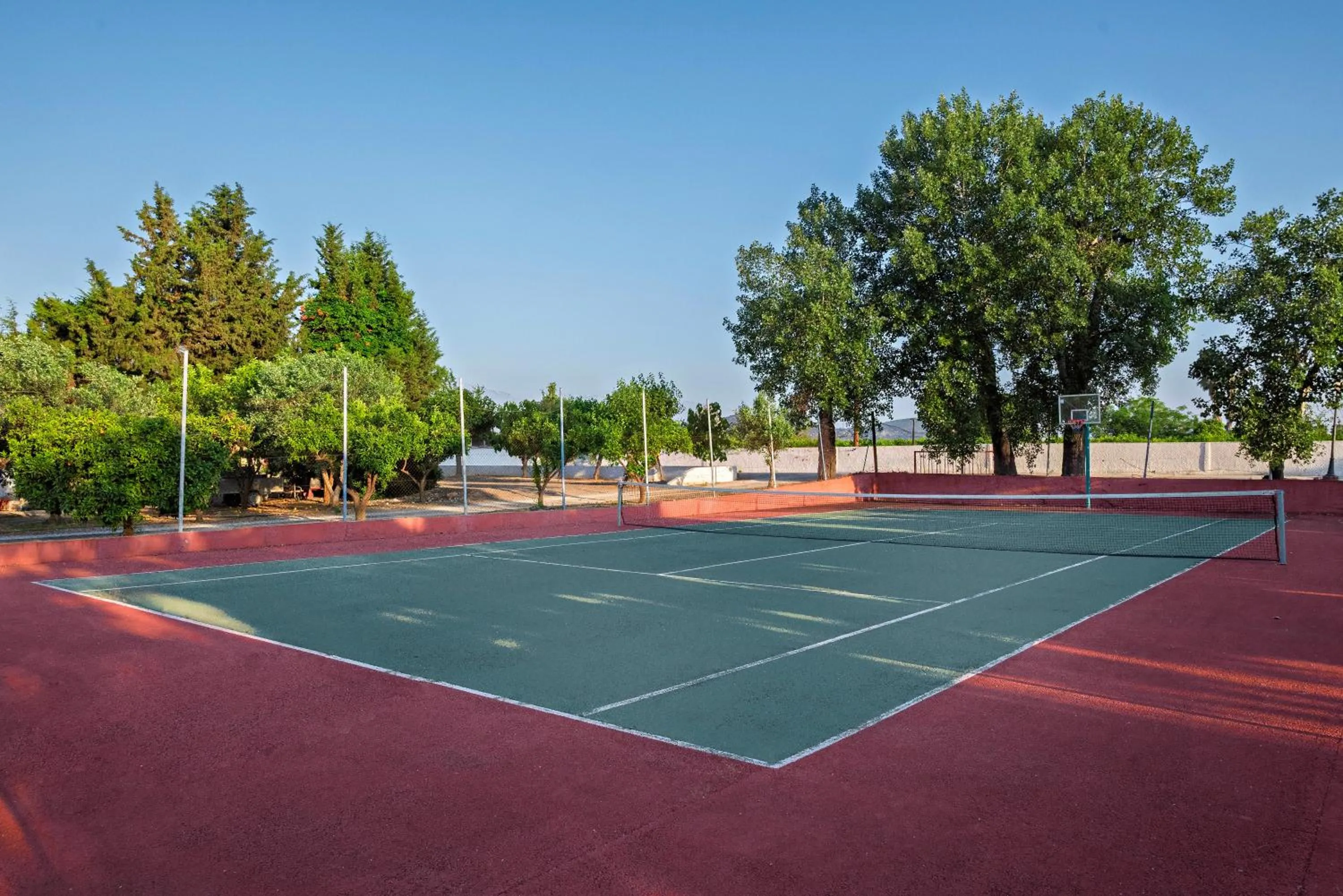 Tennis court in The Grove Seaside Hotel