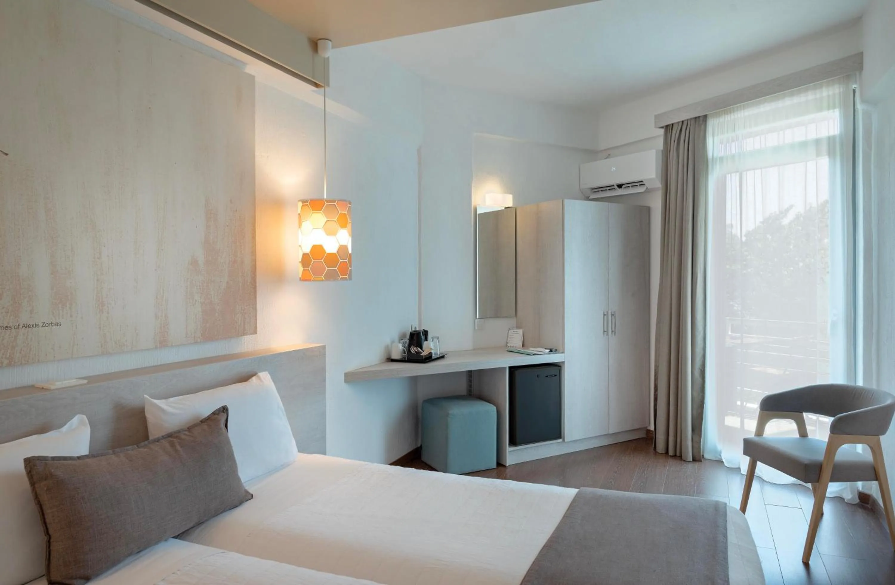 Bed in The Grove Seaside Hotel