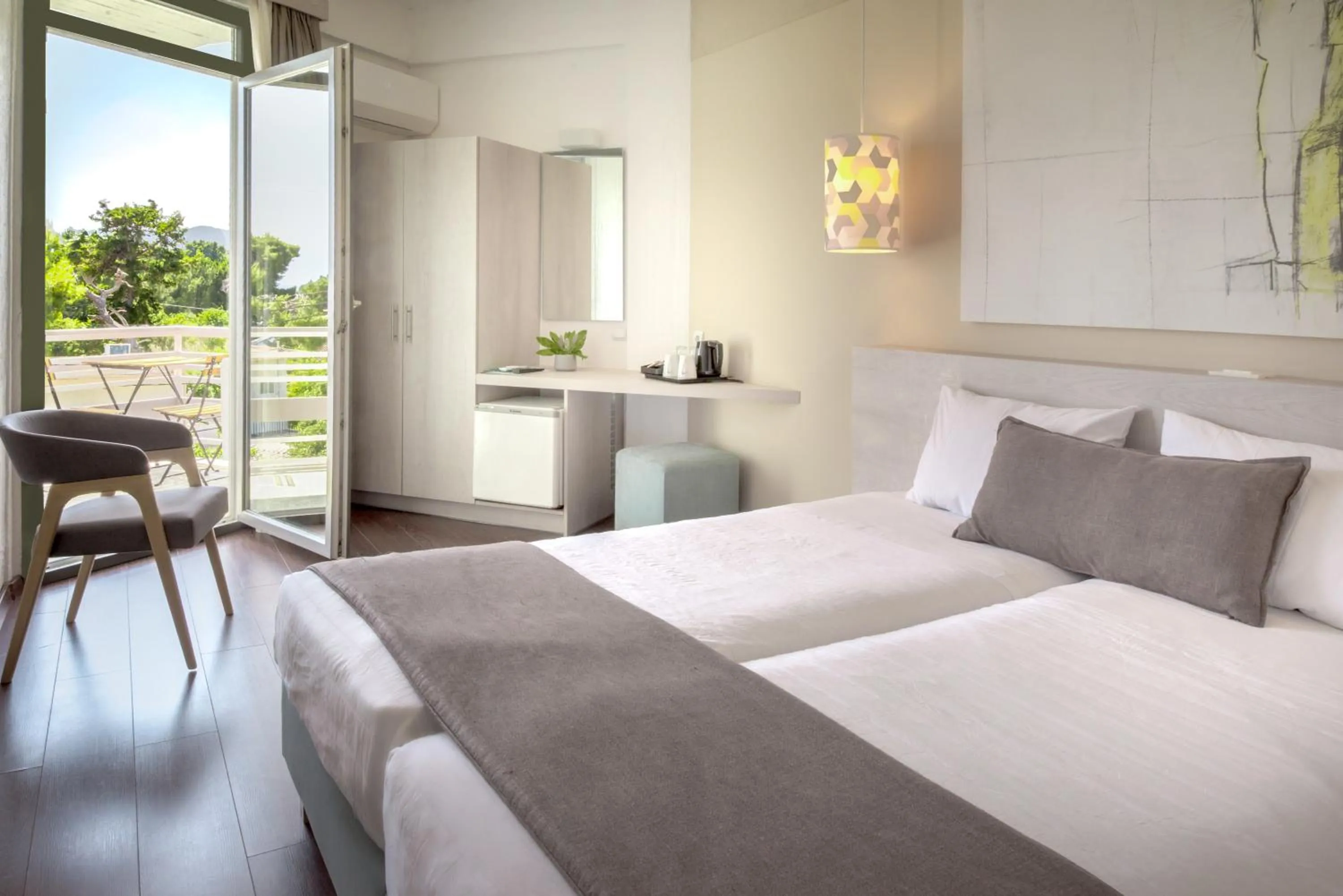 Bed in The Grove Seaside Hotel