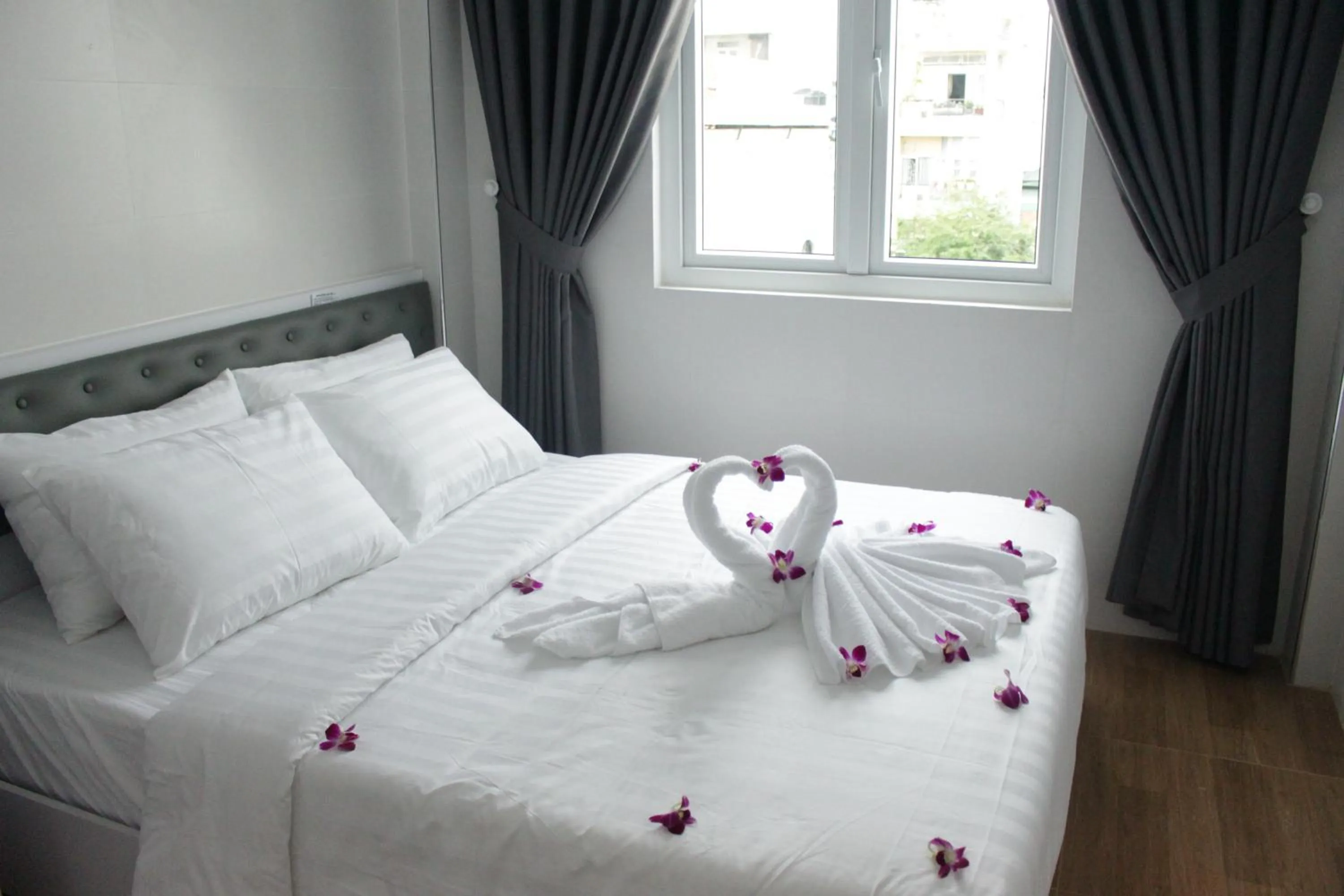 Bed in DRAGON HOTEL 1