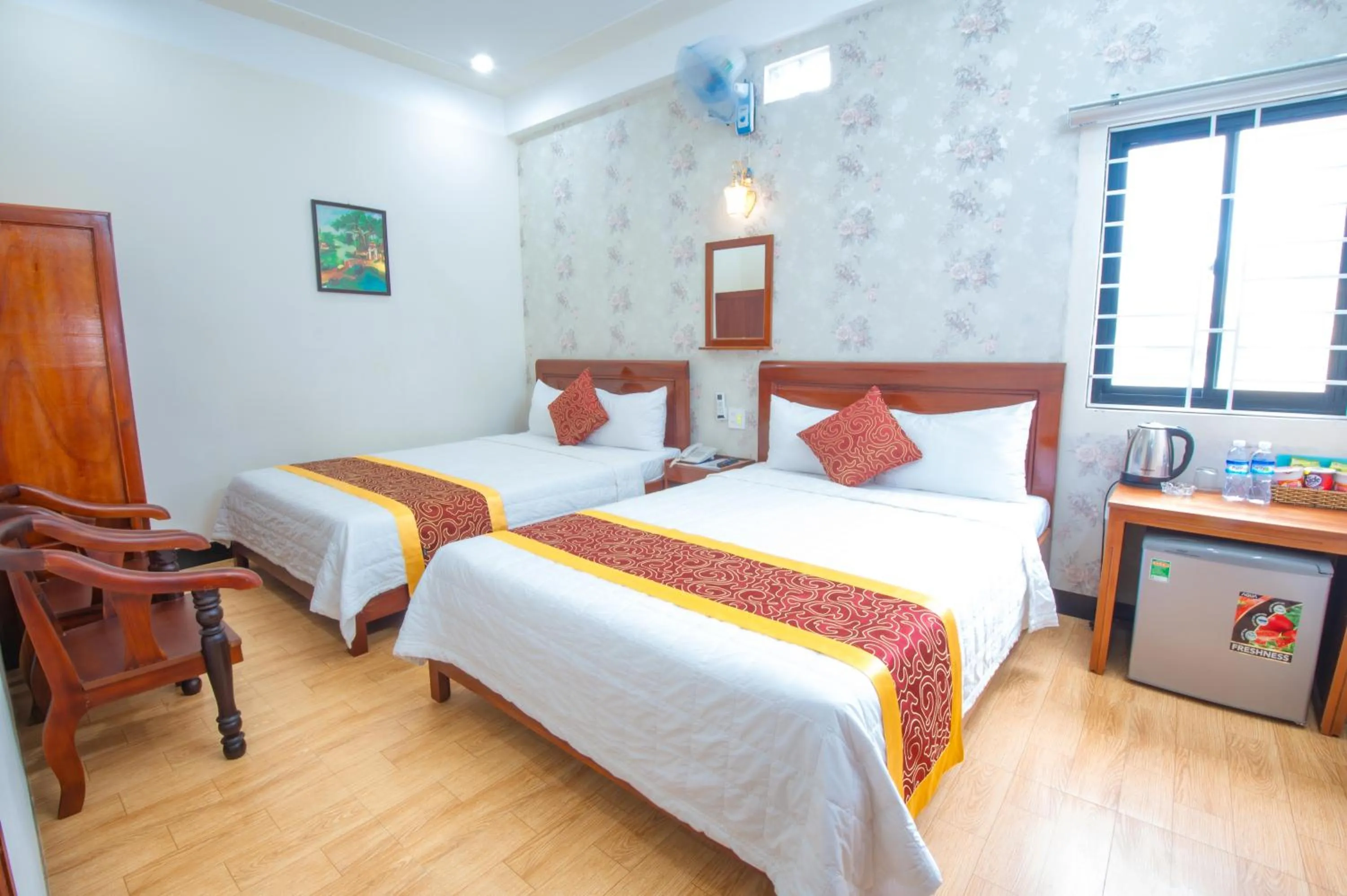 Bed in NEW DAY HOTEL