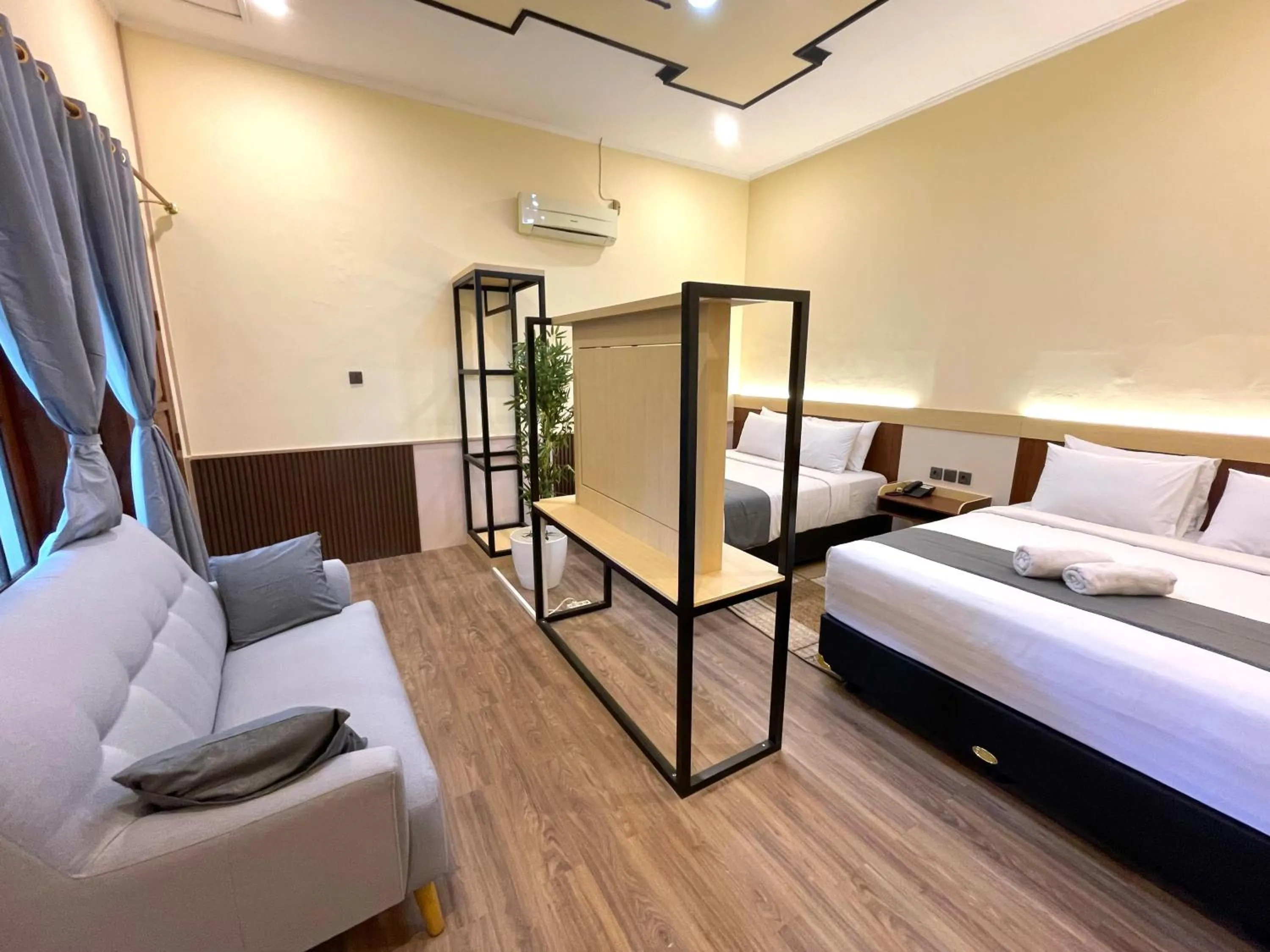Bedroom, Bed in Berlian Abadi Hotel by Sinergi