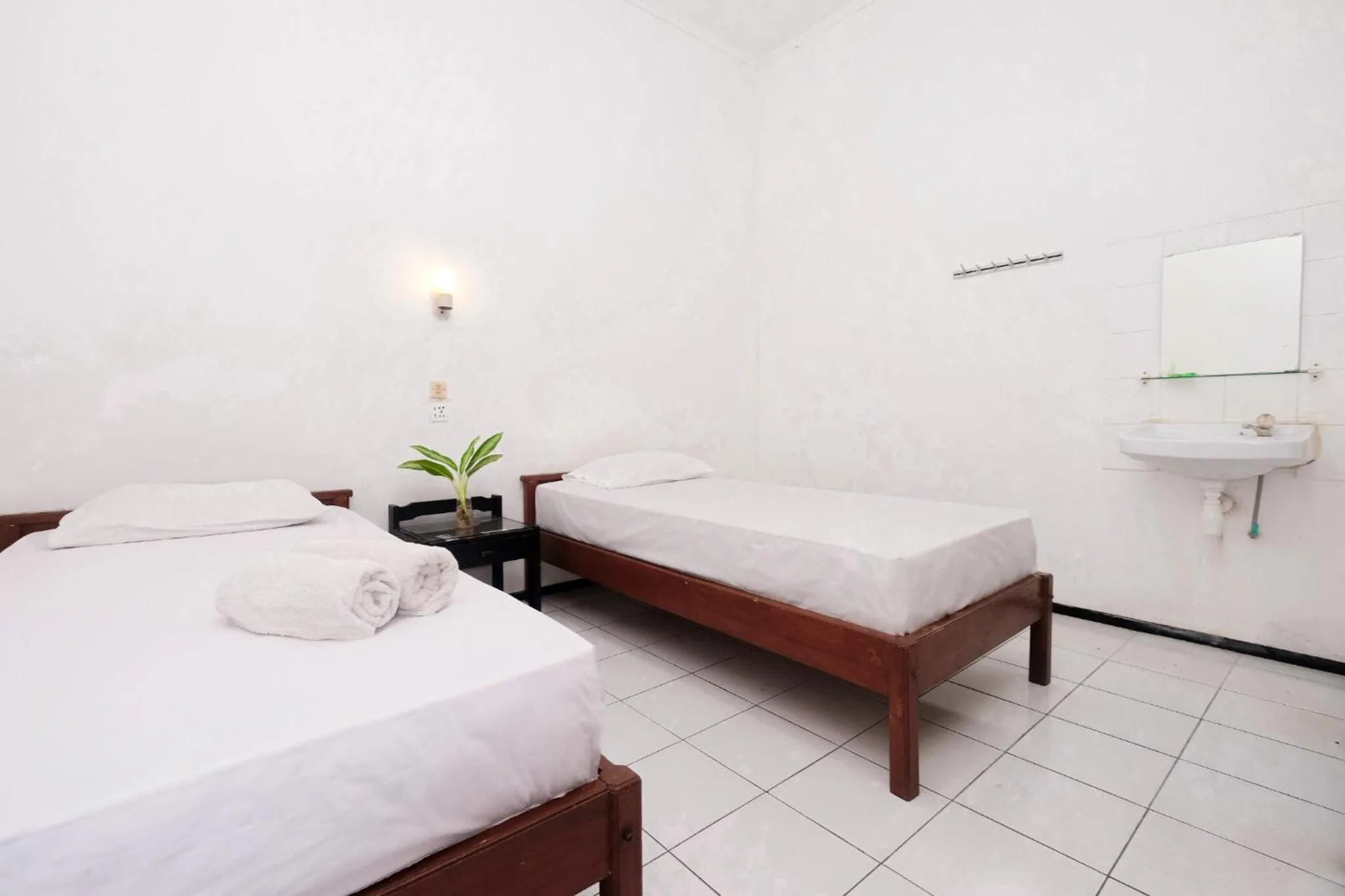 Bed in Berlian Abadi Hotel by Sinergi