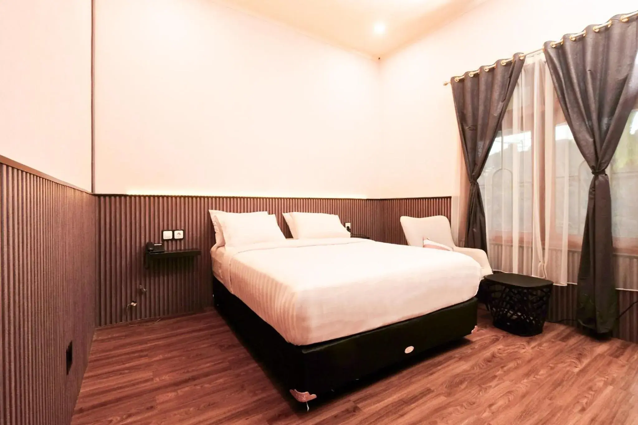 Bed in Berlian Abadi Hotel by Sinergi Bed in Berlian Abadi Hotel by Sinergi