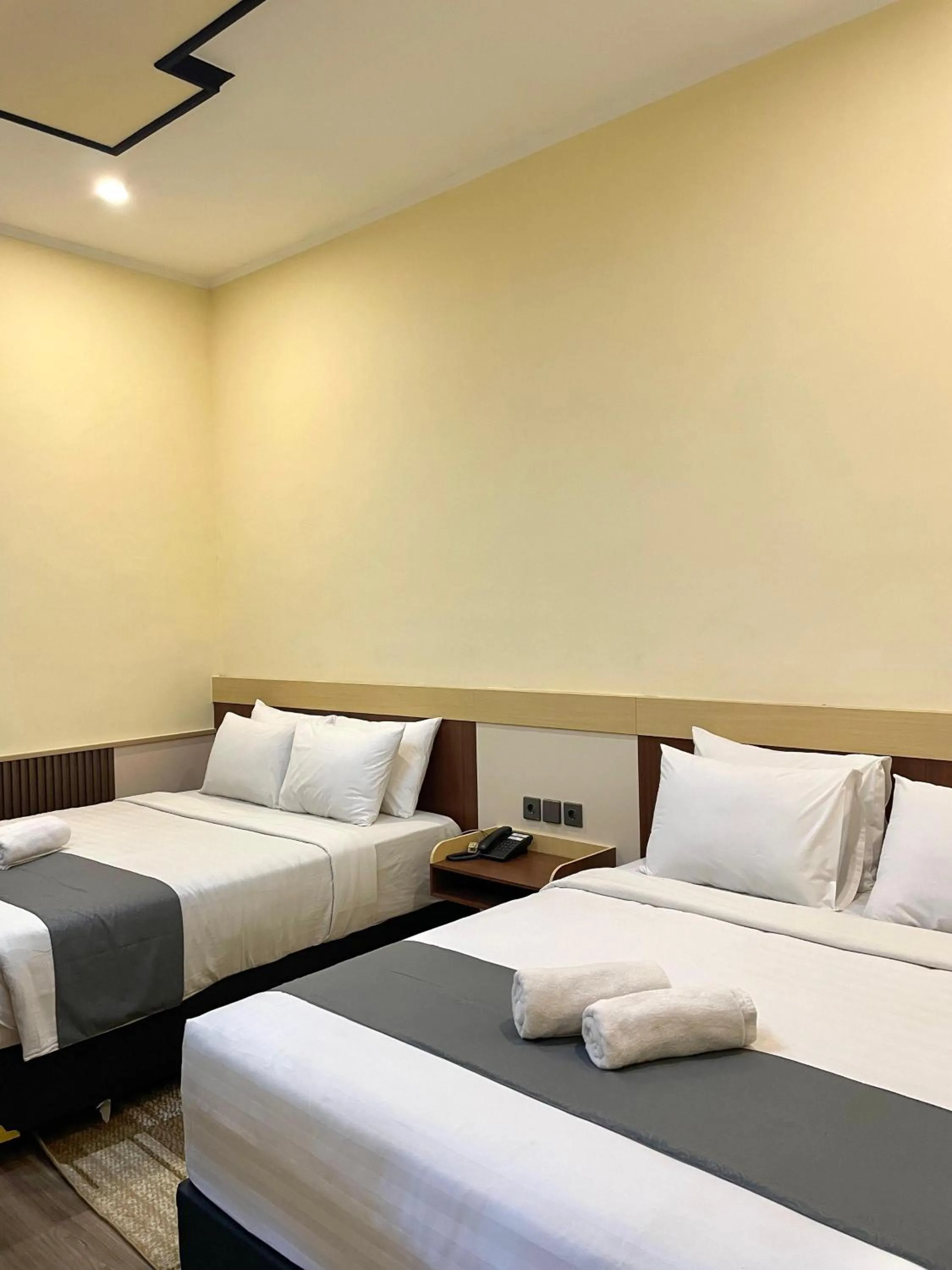 Bed in Berlian Abadi Hotel by Sinergi