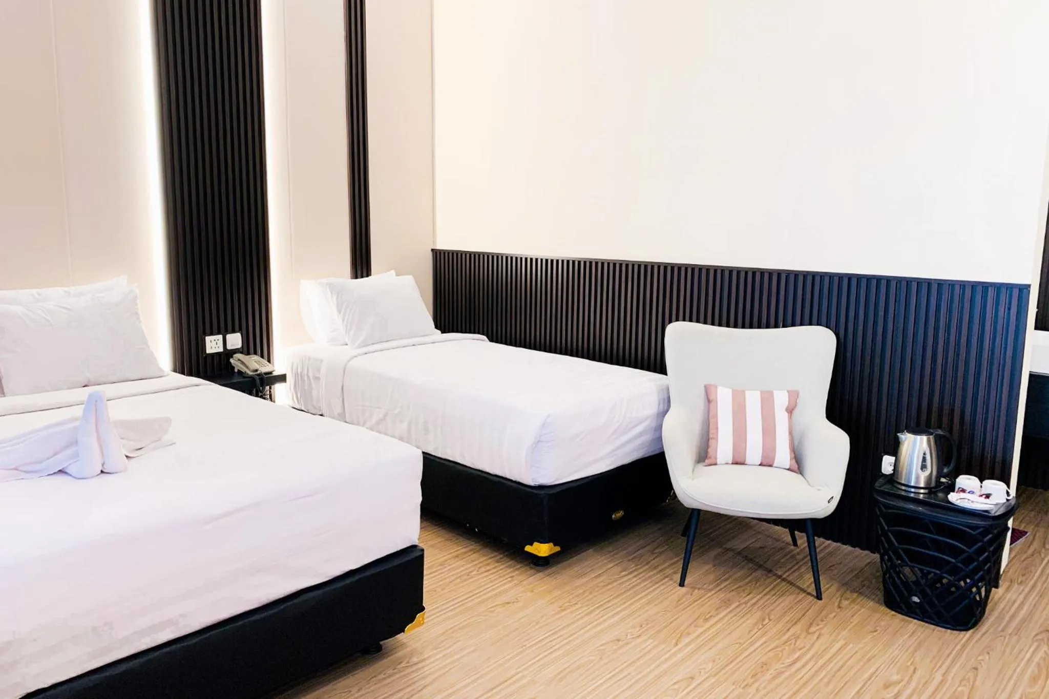 Photo of the whole room, Bed in Berlian Abadi Hotel by Sinergi