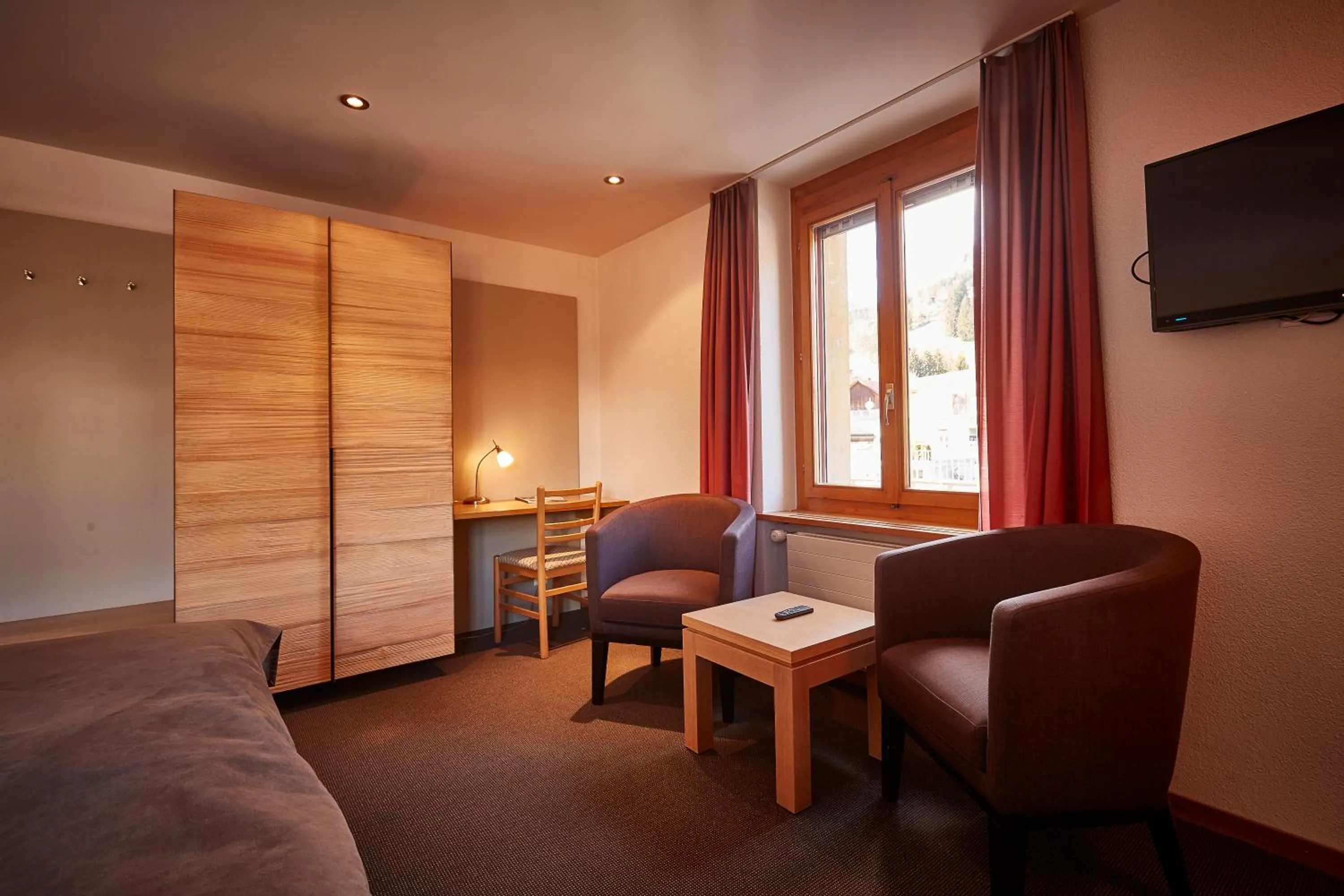 Seating area, Bed in Hotel Landhaus
