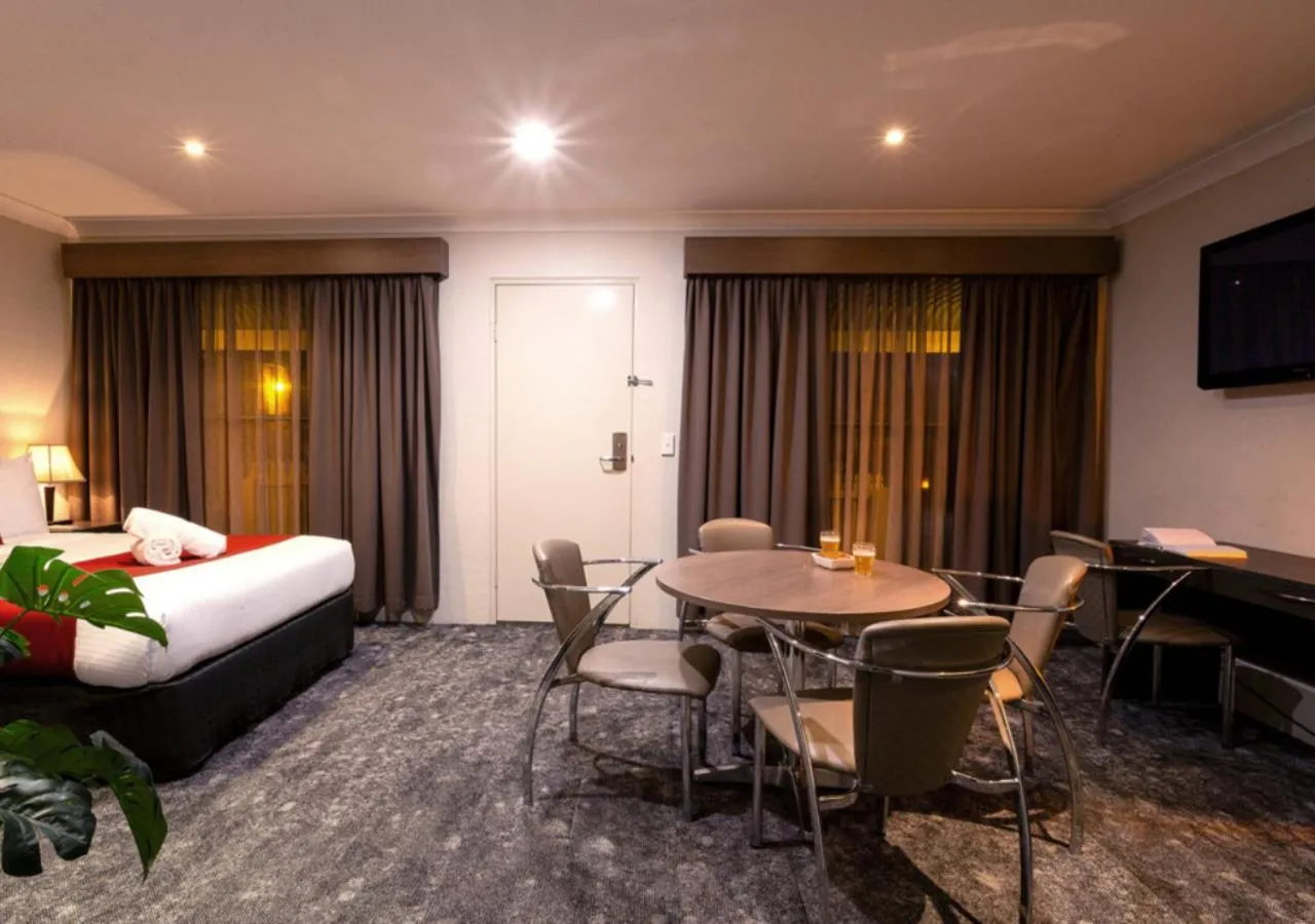 Seating area, Bed in Parkes International