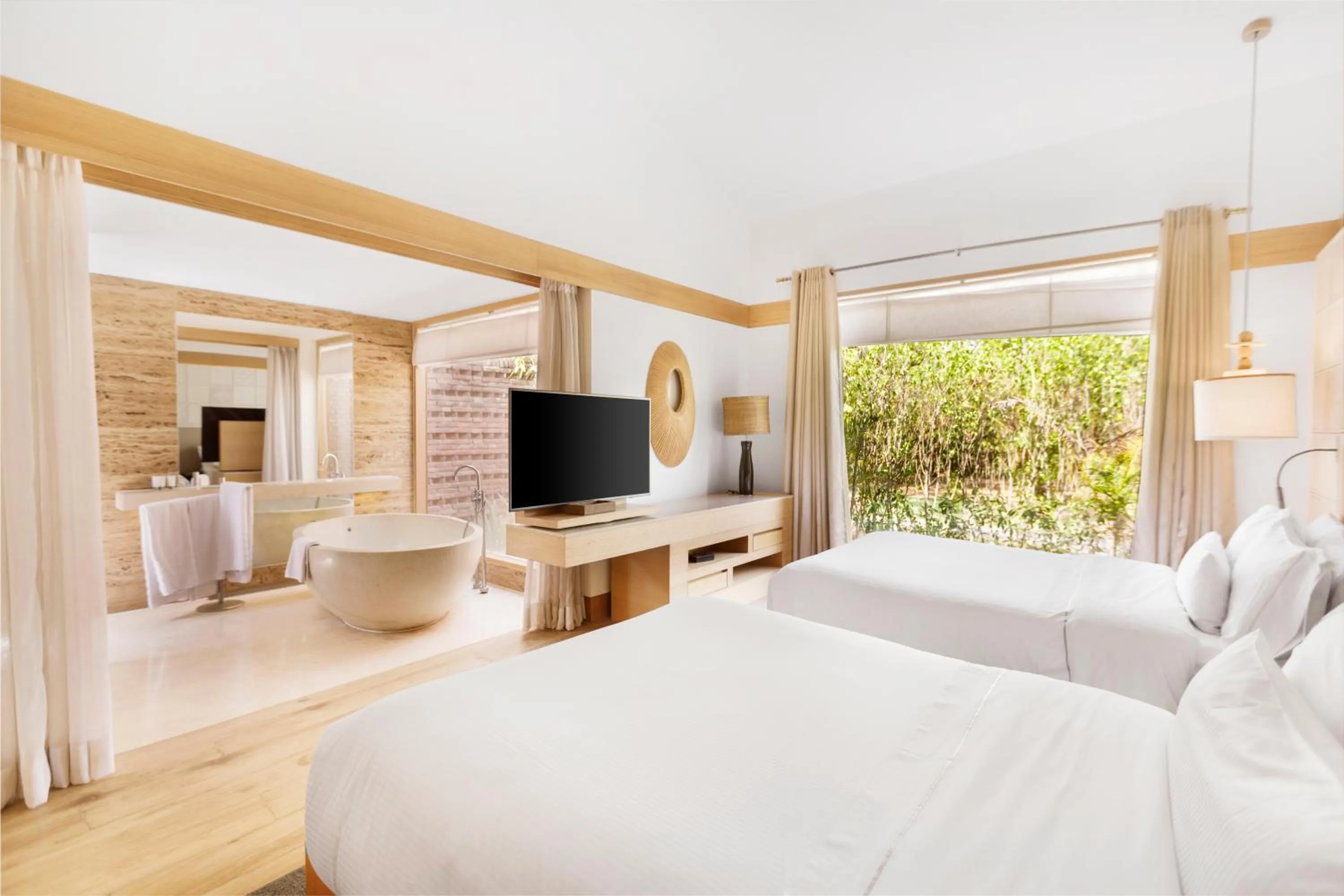 Bed in The Westin Sohna Resort & Spa